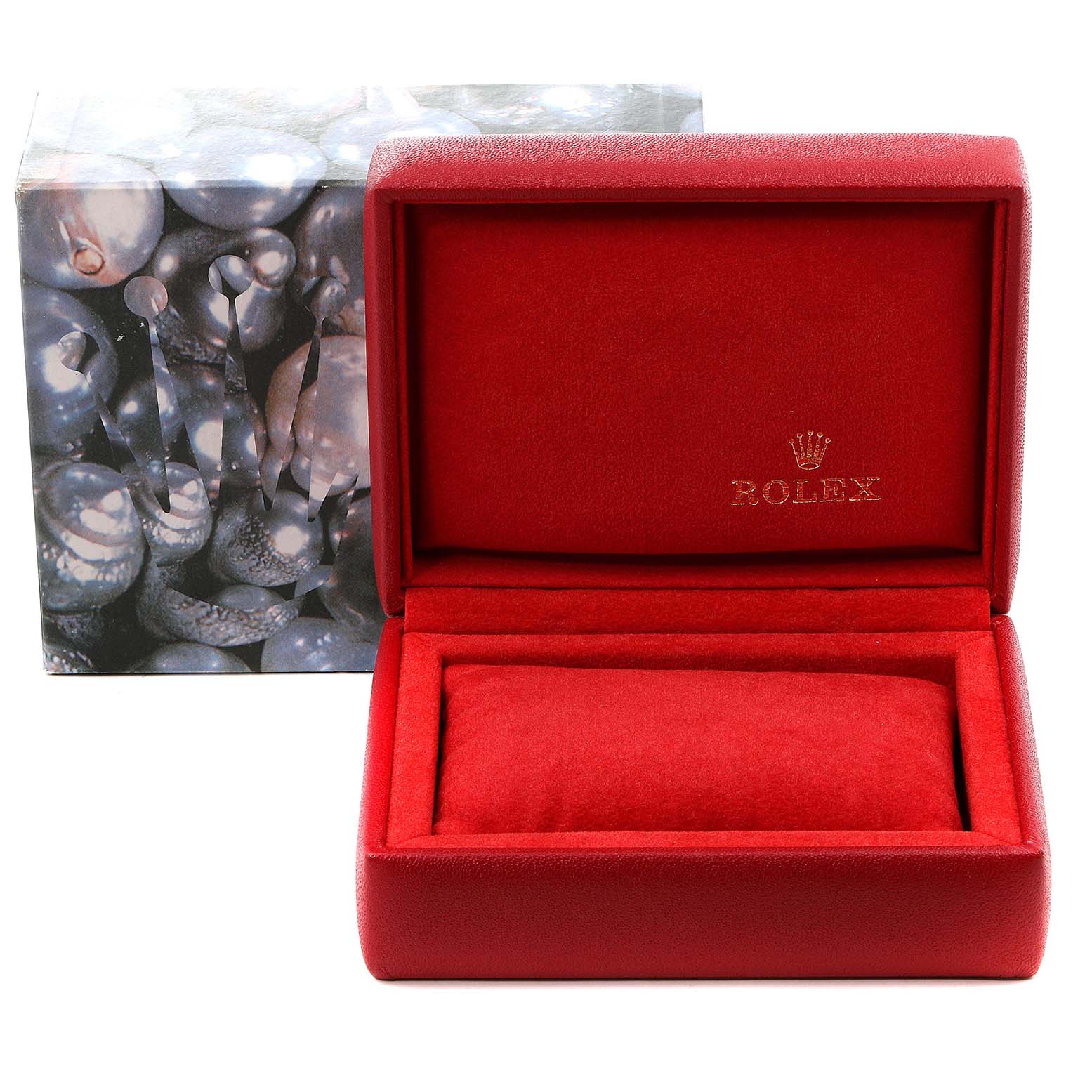 This image shows an open red Rolex Datejust 69173 Women's Steel and Gold (two tone) White Dial 69173 Women's Steel and Gold (two tone) White Dial watch box with a branded cushion inside and an outer packaging in the background.