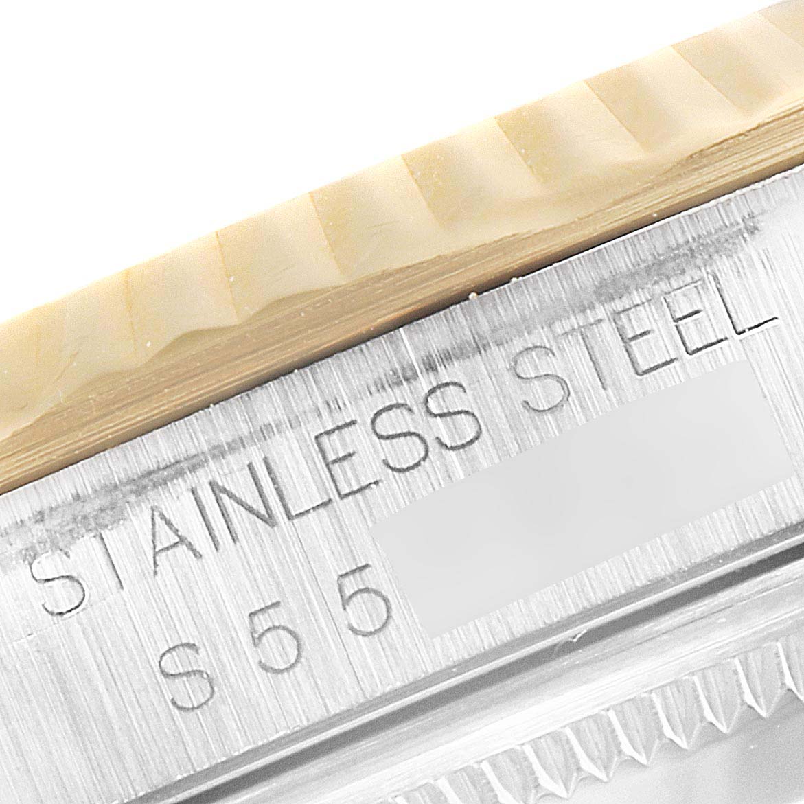 The image shows a close-up of the stainless steel case side and bezel of the Rolex Datejust 16233 Men's Steel and Gold (two tone) White Dial 16233 Men's Steel and Gold (two tone) White Dial watch.