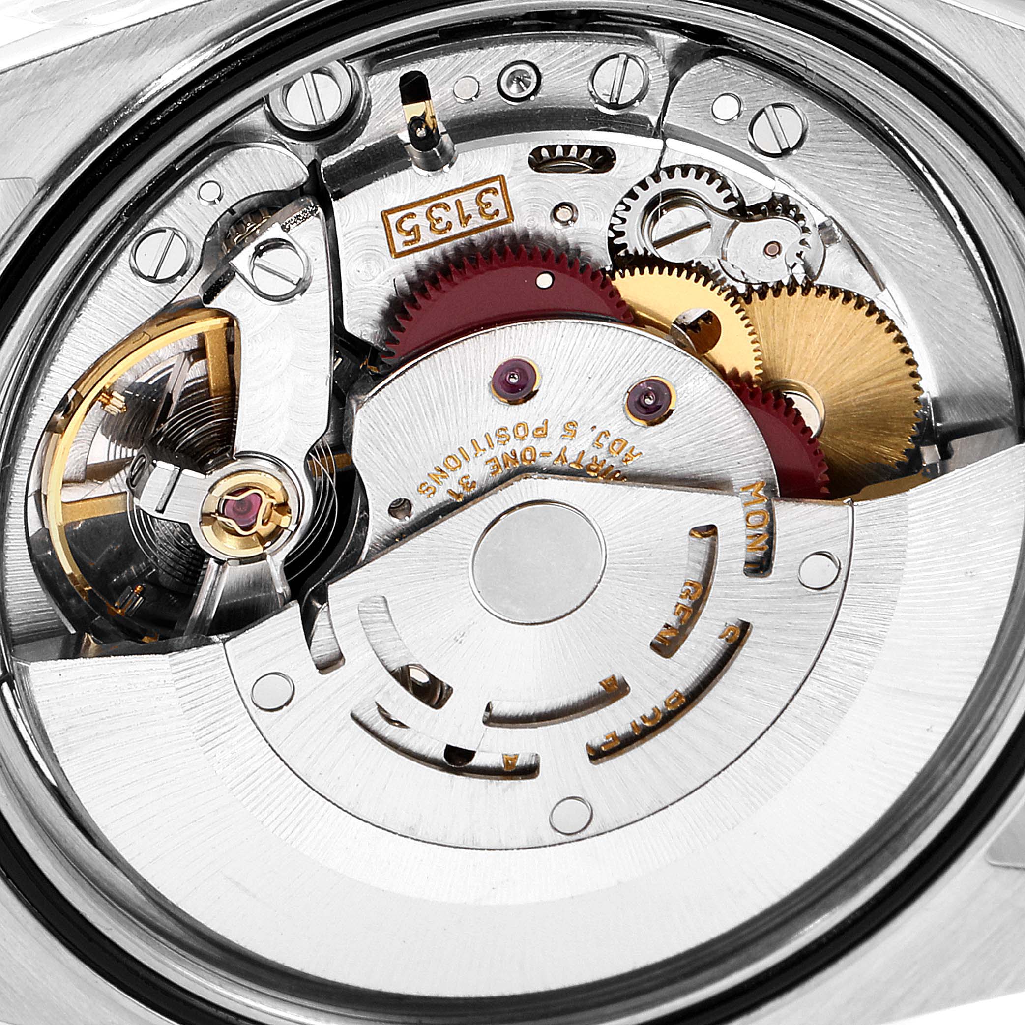 This image shows a close-up view of the movement mechanism of a Rolex Datejust 16233 Men's Steel and Gold (two tone) White Dial 16233 Men's Steel and Gold (two tone) White Dial watch.