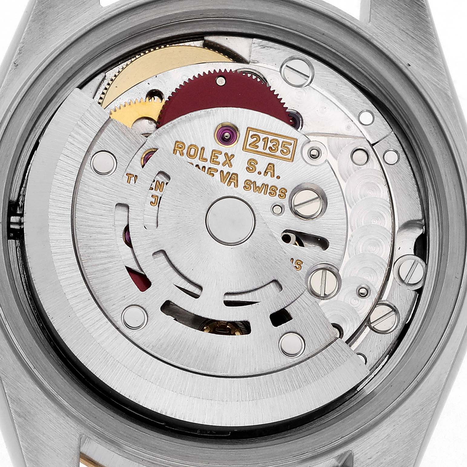 The image shows the movement of a Rolex Datejust 69173 Women's Steel and Gold (two tone) White Dial 69173 Women's Steel and Gold (two tone) White Dial from the back, highlighting the rotor and intricate components.