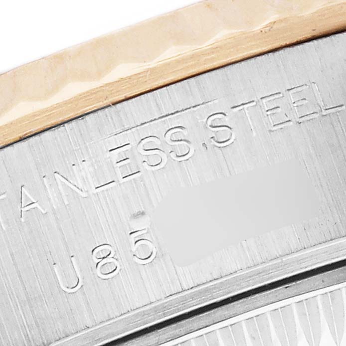 The image shows a close-up of the stainless steel case back edge of a Rolex Datejust 69173 Women's Steel and Gold (two tone) White Dial 69173 Women's Steel and Gold (two tone) White Dial watch.