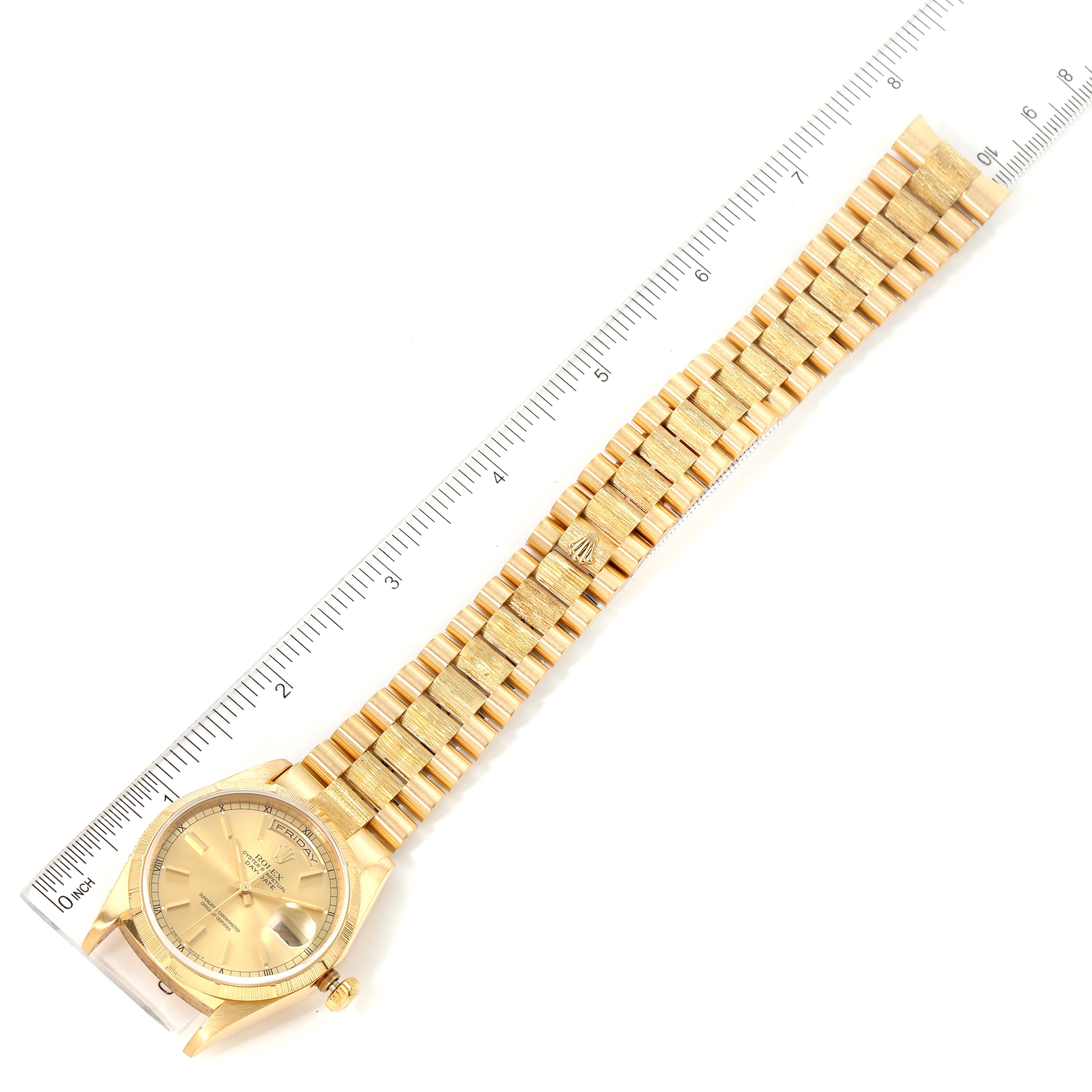 The image shows an overhead view of the Rolex President 18248 Men's Yellow Gold Champagne Dial 18248 Men's Yellow Gold Champagne Dial model watch, displaying the watch face and full bracelet beside a ruler.