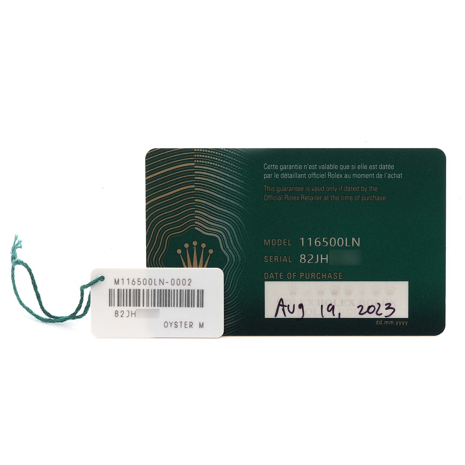 The image shows a Rolex Daytona 116500LN Men's Stainless Steel Black Dial 116500LN Men's Stainless Steel Black Dial model 116500LN warranty card and a tag with serial information.