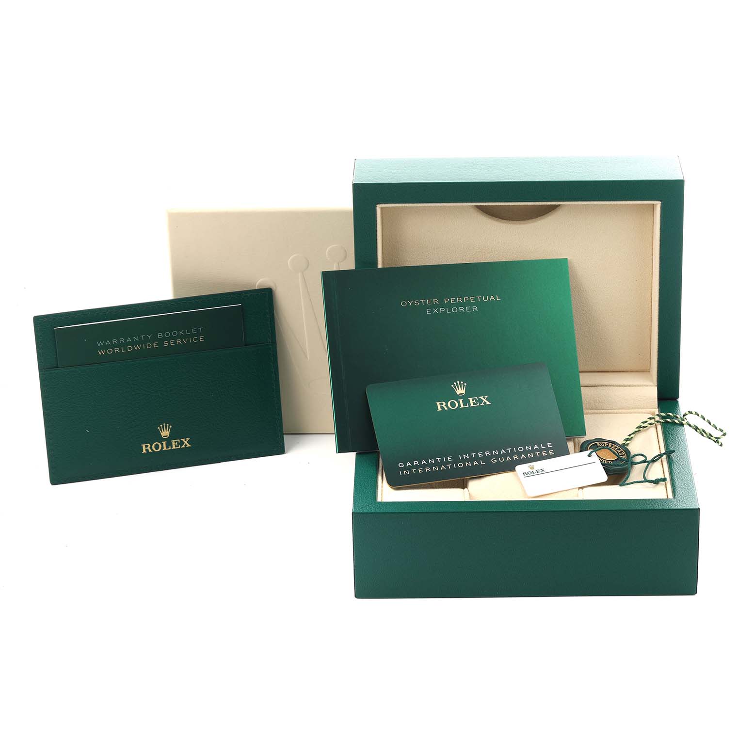 The image shows the packaging and accessories of a Rolex Explorer 224270 Men
s Stainless Steel Black Dial 224270 Men
s Stainless Steel Black Dial, including a box, booklets, and warranty card.