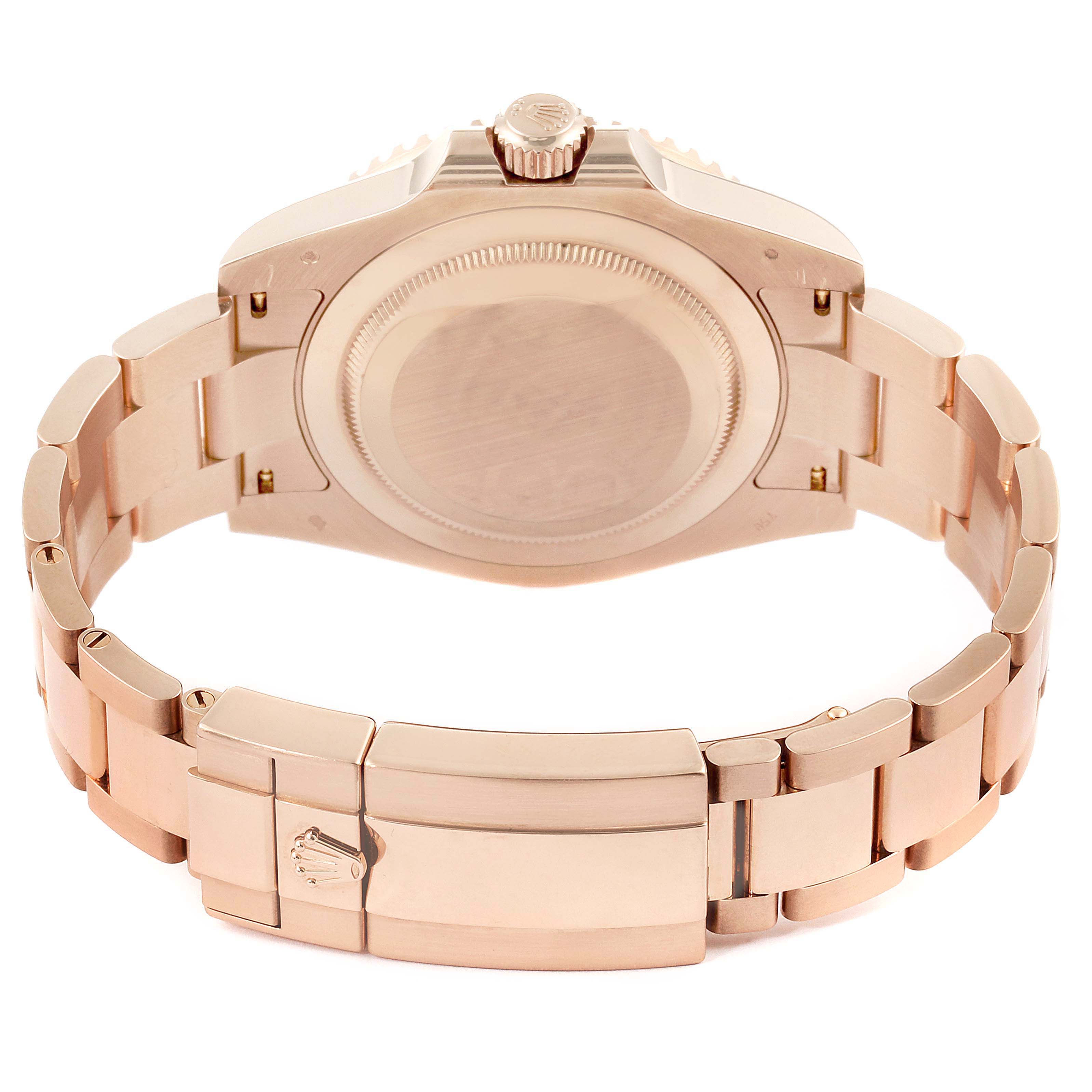 This image shows the back case and bracelet clasp of a Rolex GMT-Master 126715 Men's Rose Gold Black Dial 126715 Men's Rose Gold Black Dial watch viewed from the rear.