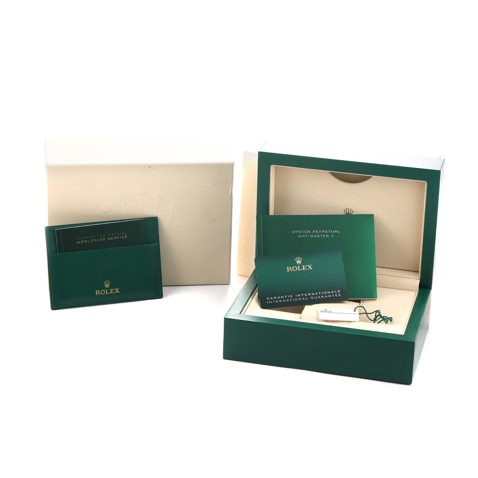 The image shows the packaging and accessories of a Rolex GMT-Master 126710 Men's Stainless Steel Black Dial, including the box, warranty cards, and service manuals.
