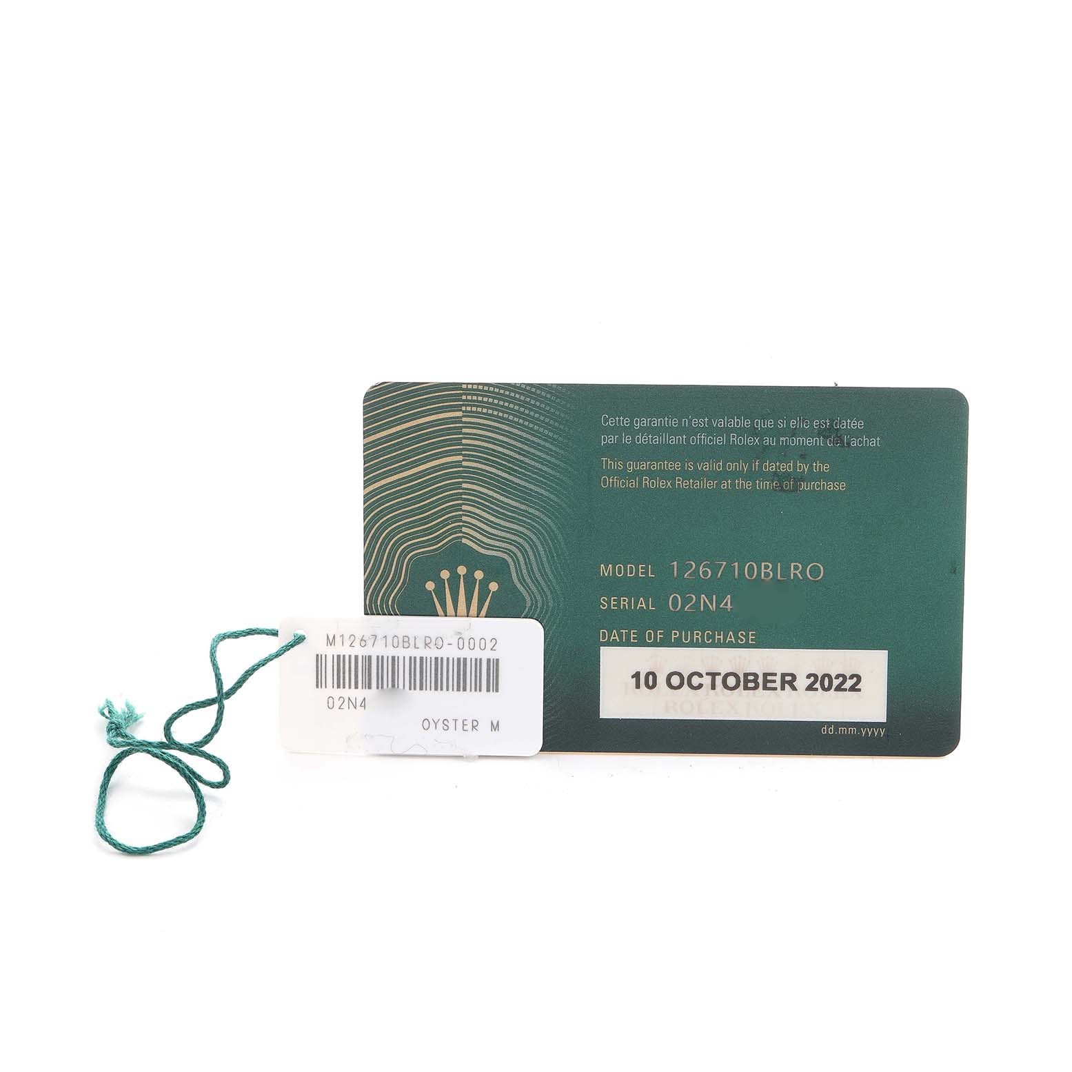 The image shows the warranty card and tag for a Rolex GMT-Master 126710 Men's Stainless Steel Black Dial, model 126710BLRO.