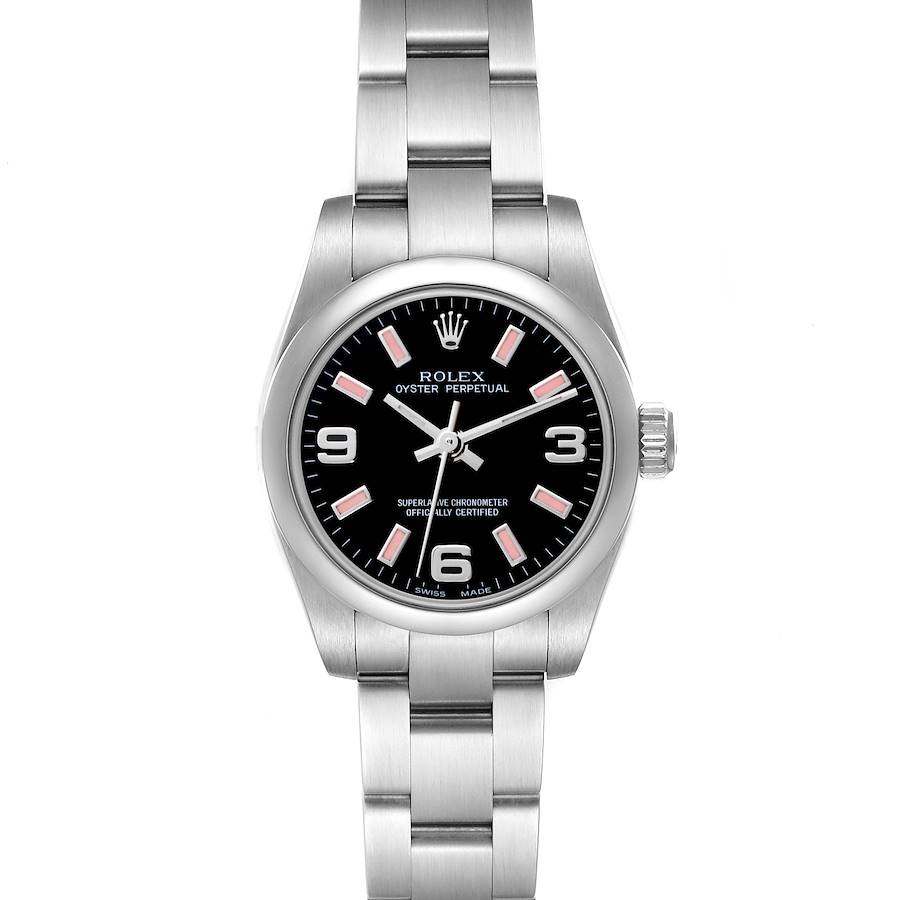 The Rolex Oyster Perpetual watch is shown from a top-down angle, displaying the face, bezel, and bracelet.