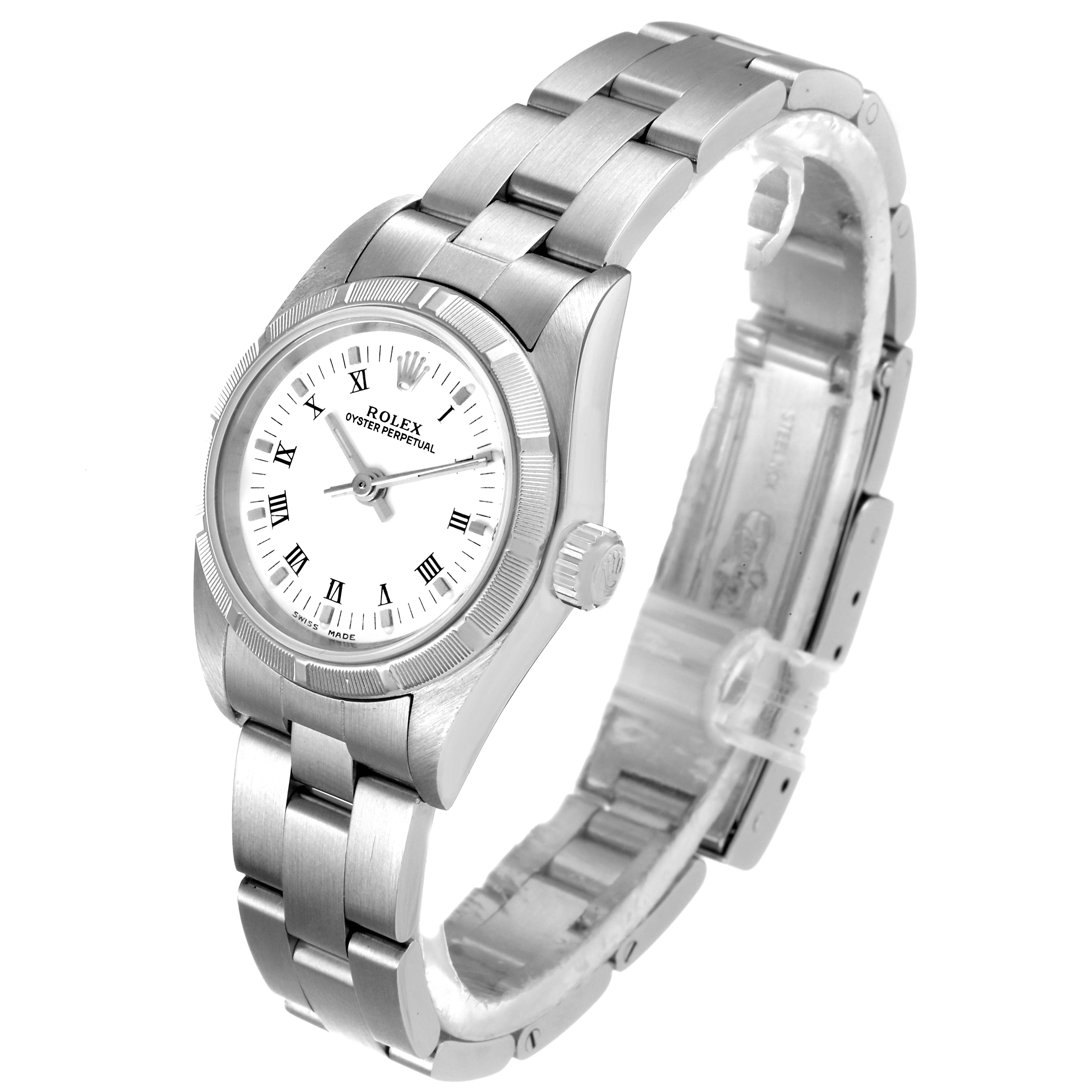 The image shows a Rolex Oyster Perpetual 76030 Women's Stainless Steel White Dial 76030 Women's Stainless Steel White Dial watch with a side view of the dial, bezel, crown, and a partially open bracelet.