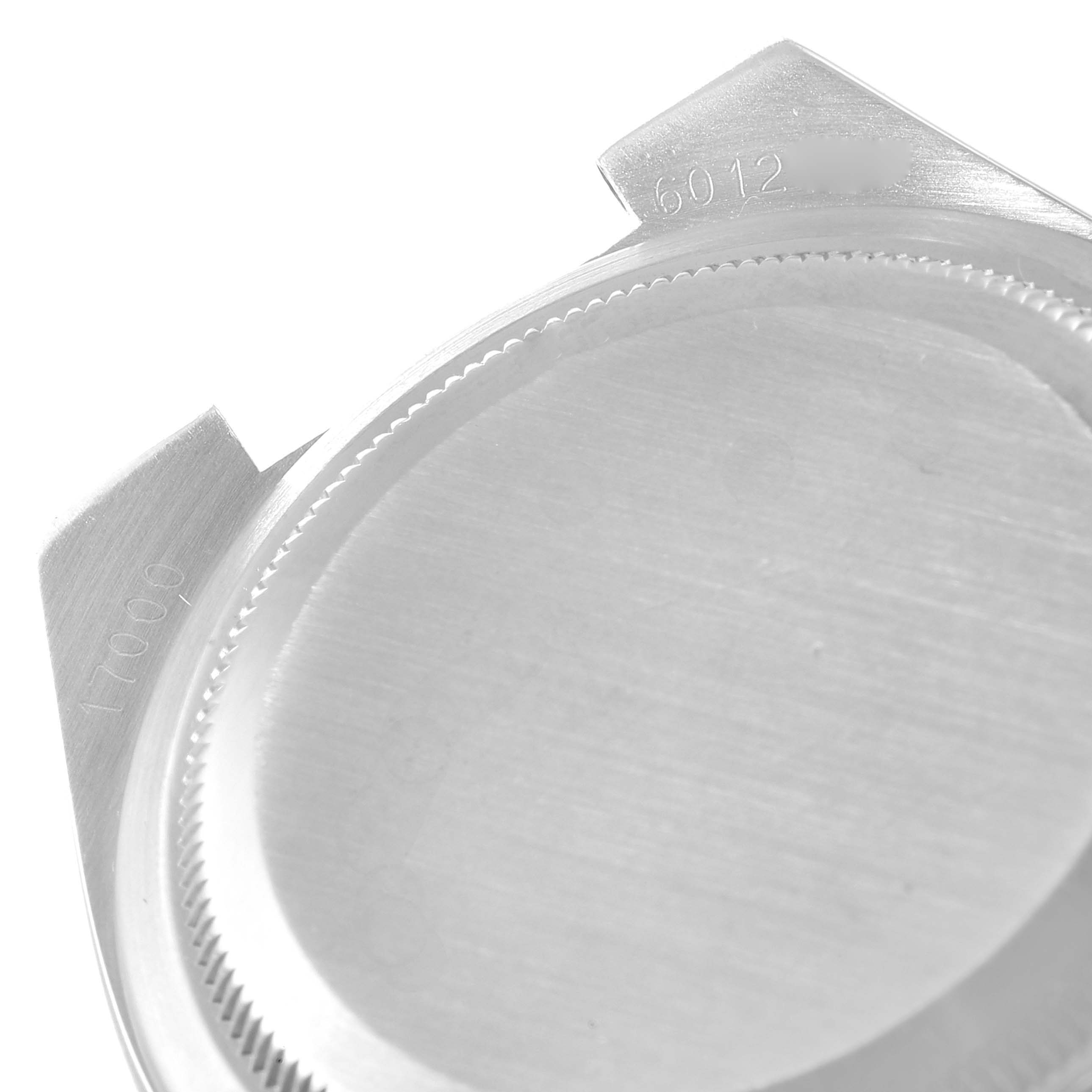 The image shows the case back of a Rolex Oysterquartz 17000 Men's Stainless Steel Silver Dial 17000 Men's Stainless Steel Silver Dial watch, emphasizing the model number engravings.