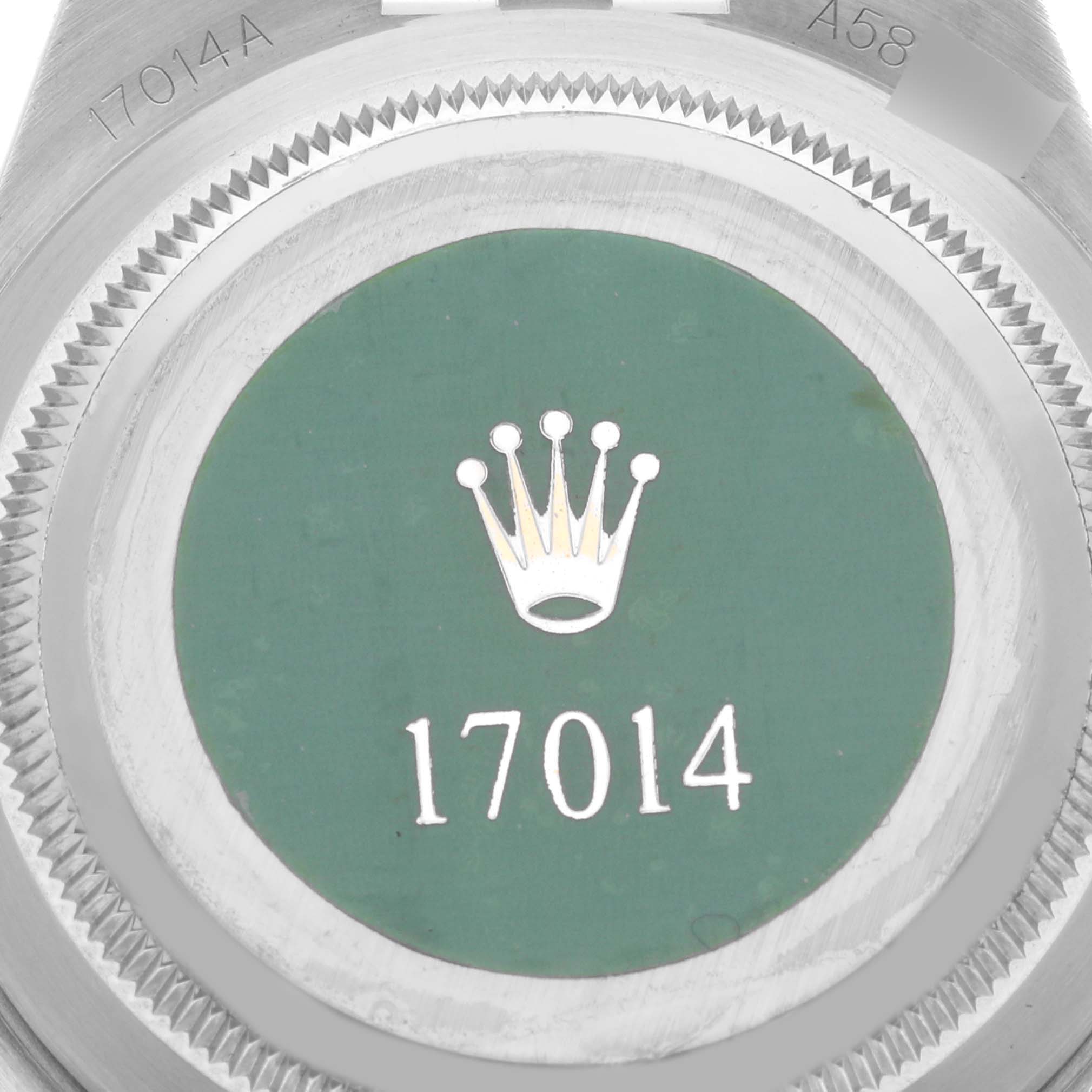 The image shows the case back of the Rolex Oysterquartz 19601 Men's Stainless Steel Silver Dial 19601 Men's Stainless Steel Silver Dial watch with model number engraving.