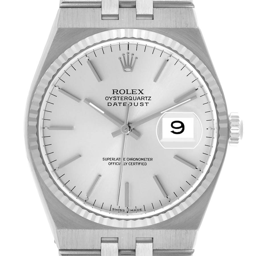 The Rolex Oysterquartz watch is shown from a front angle, displaying the dial, hands, crown, and part of the bracelet.