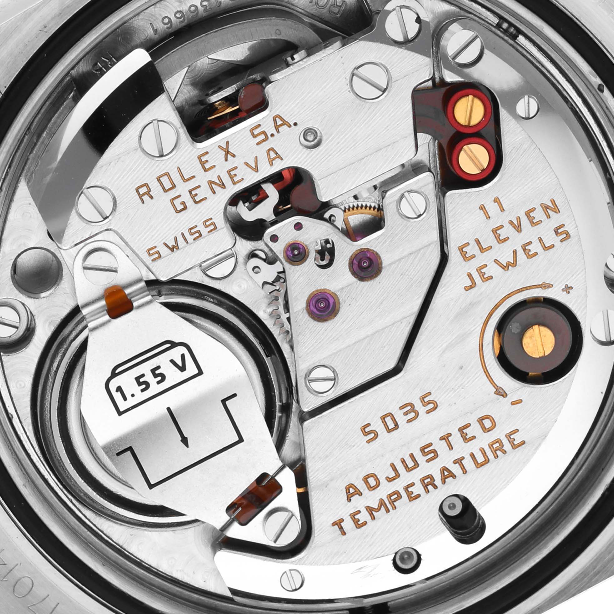 The image shows the intricate mechanism of a Rolex Oysterquartz 19601 Men's Stainless Steel Silver Dial 19601 Men's Stainless Steel Silver Dial watch, highlighting its movement and internal components.