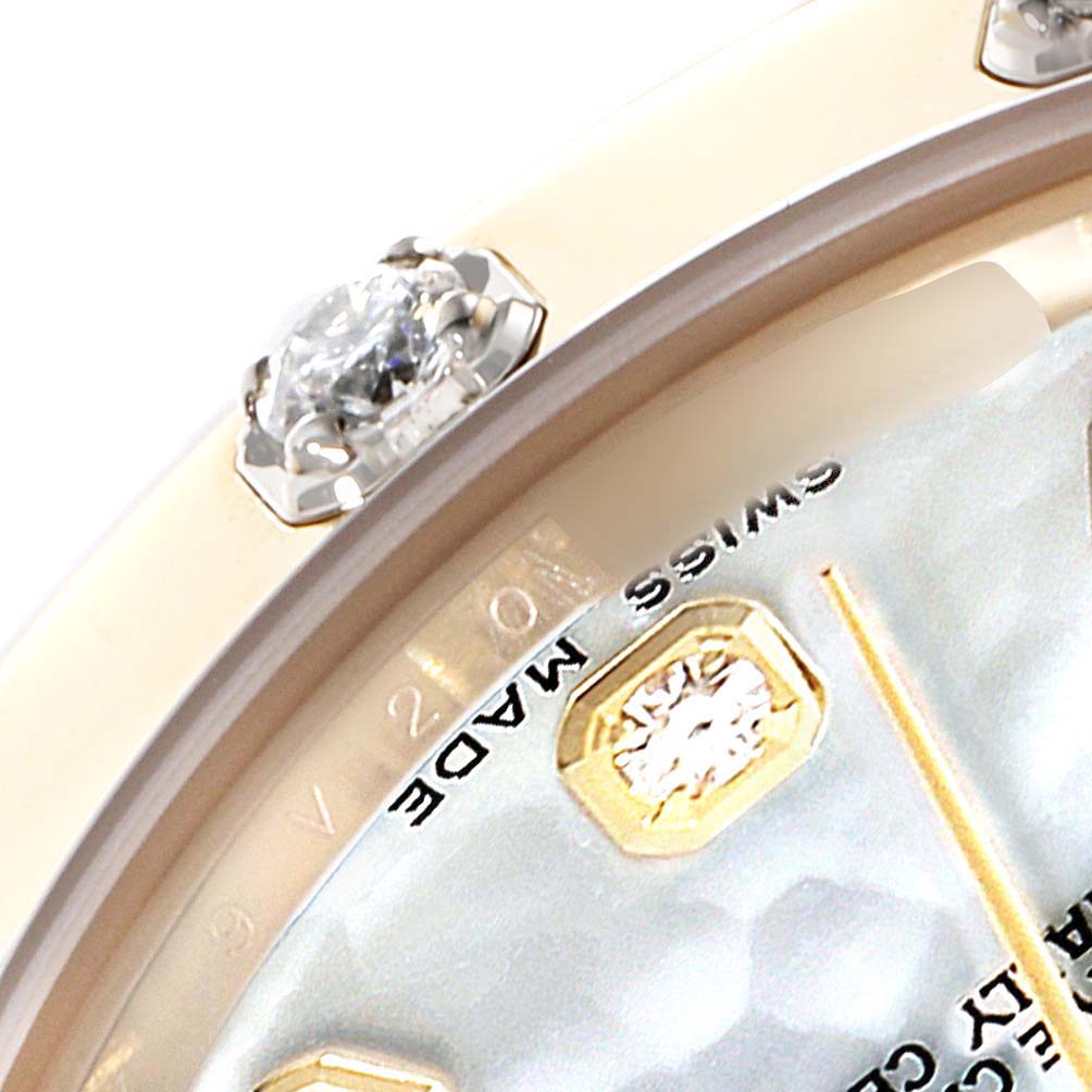 This image shows a close-up of the bezel and dial of the Rolex Pearlmaster 81318 Women's Yellow Gold Mother of Pearl Dial 81318 Women's Yellow Gold Mother of Pearl Dial watch, highlighting the diamond-studded markers.