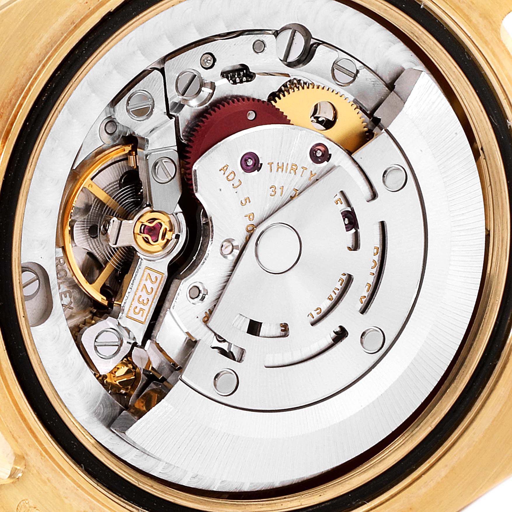 The image shows an interior view of the Rolex Pearlmaster 81318 Women's Yellow Gold Mother of Pearl Dial 81318 Women's Yellow Gold Mother of Pearl Dial watch movement, highlighting its intricate mechanical components.