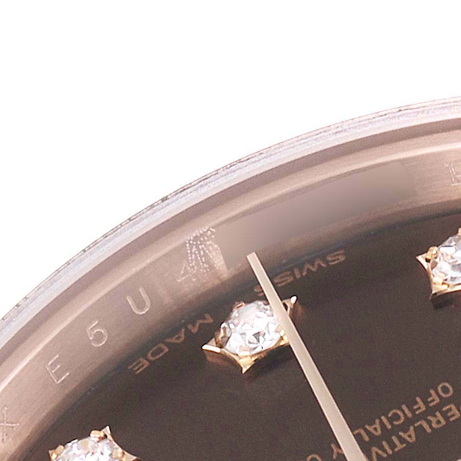 This close-up image shows the dial and diamond hour markers of a Rolex President 279165 Women's Rose Gold Brown Dial 279165 Women's Rose Gold Brown Dial model watch.