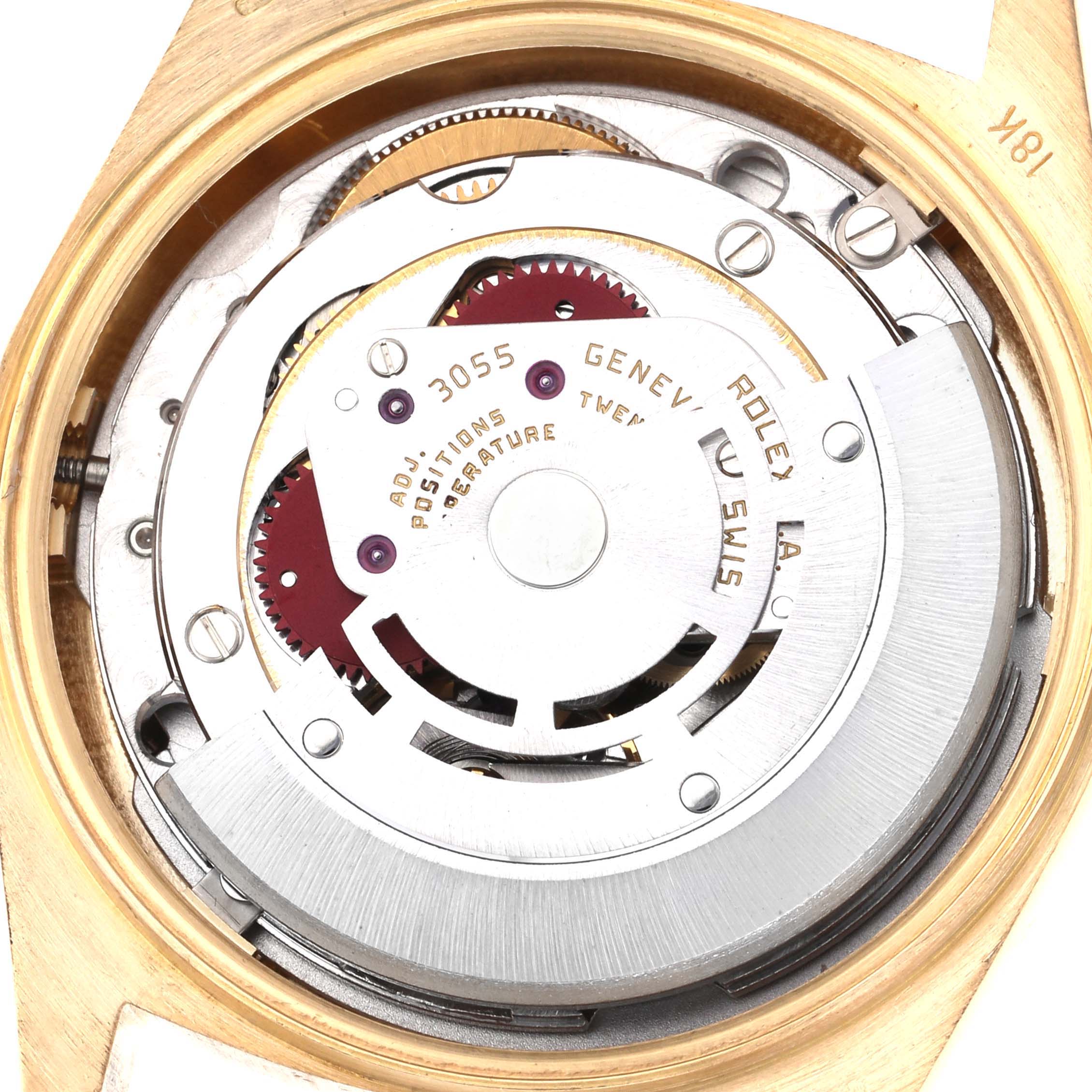 The image shows the Rolex President 18038 Men
s Yellow Gold Champagne Dial 18038 Men
s Yellow Gold Champagne Dial model
s movement, focusing on the rotor and internal mechanisms from the back.