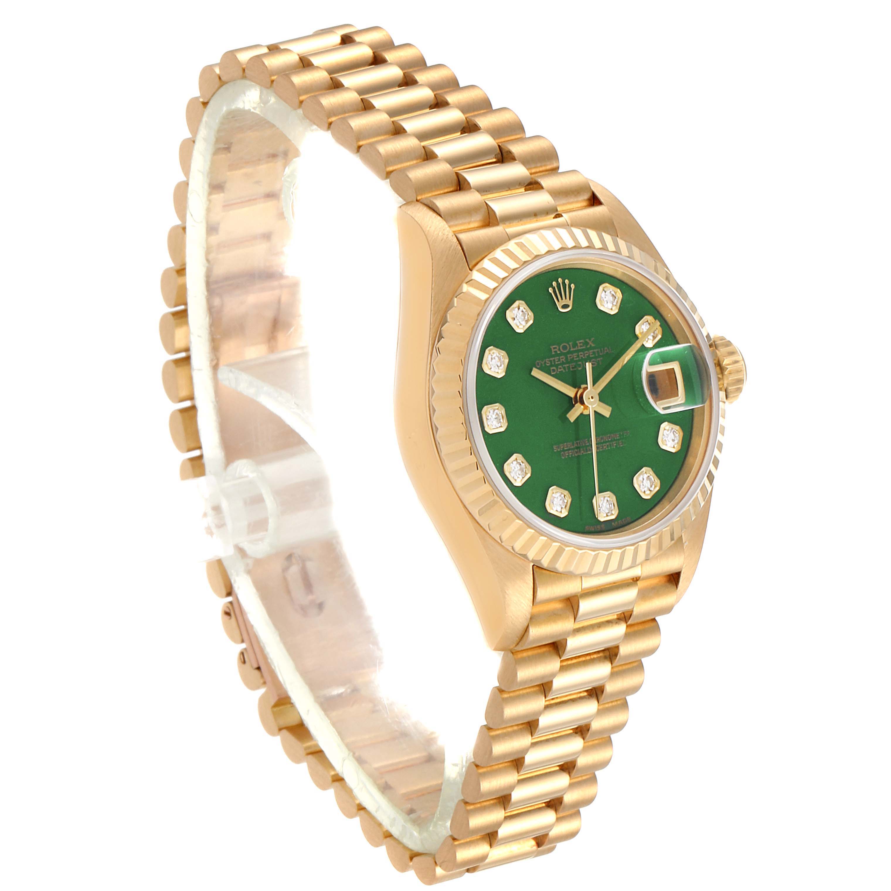 The image shows a Rolex President 69178 Women's Yellow Gold Green Dial 69178 Women's Yellow Gold Green Dial watch at an angle displaying its gold bracelet, green dial, and fluted bezel with diamond hour markers.