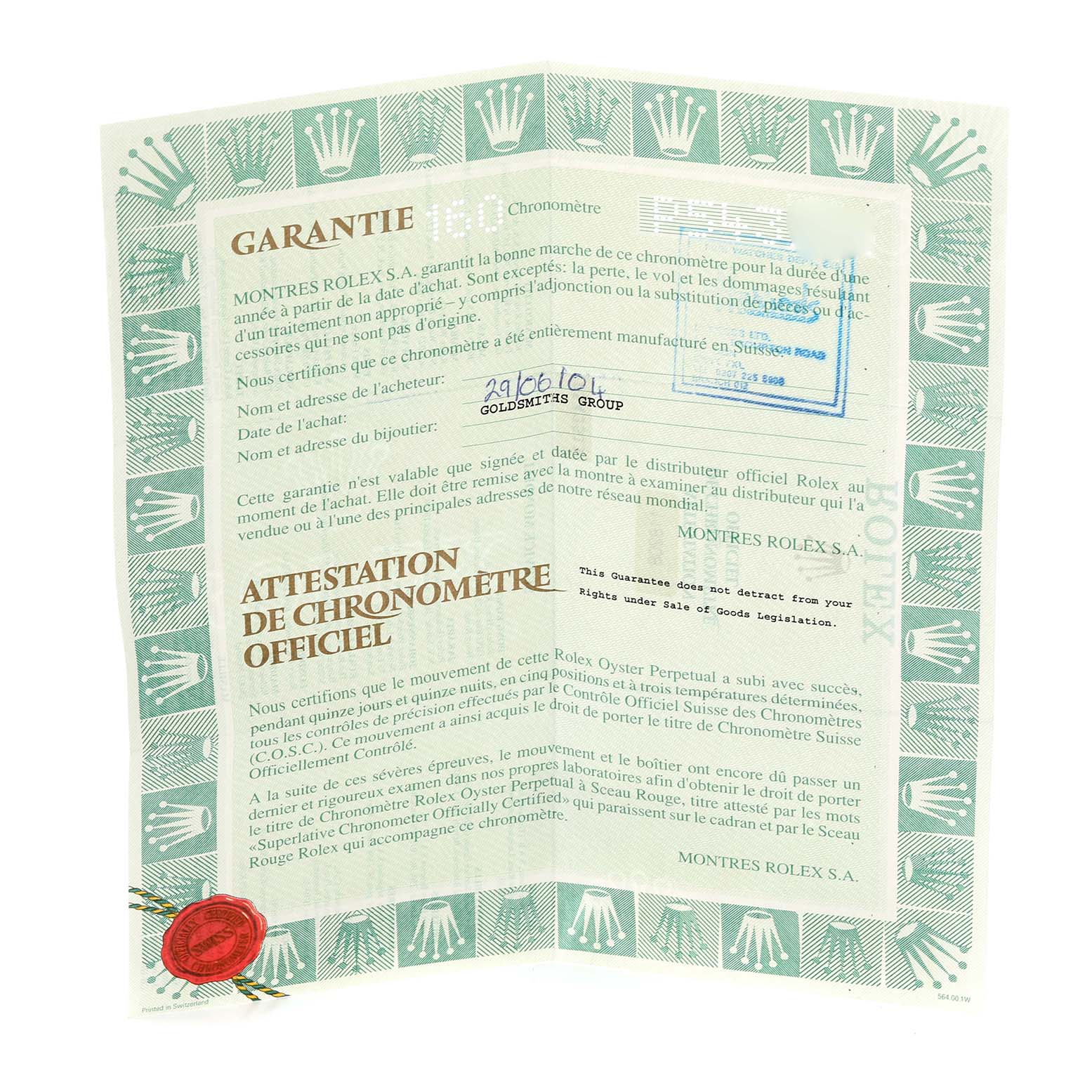 The image shows a Rolex warranty certificate for the President model with green decorative borders and a red seal.