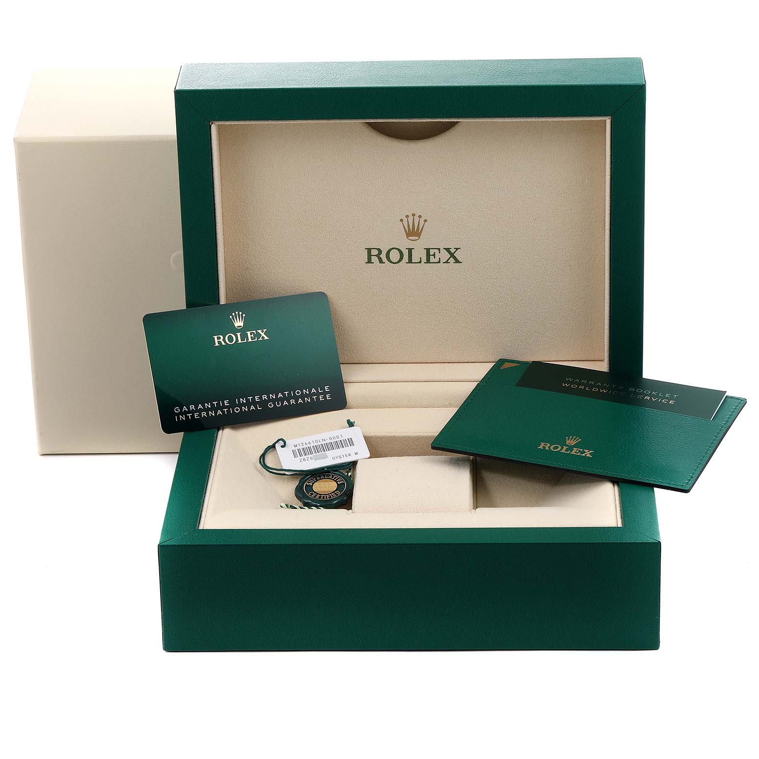 This image shows the open box and documentation for a Rolex Submariner 126610LN Men
s Stainless Steel Black Dial 126610LN Men
s Stainless Steel Black Dial watch, including the international guarantee card.