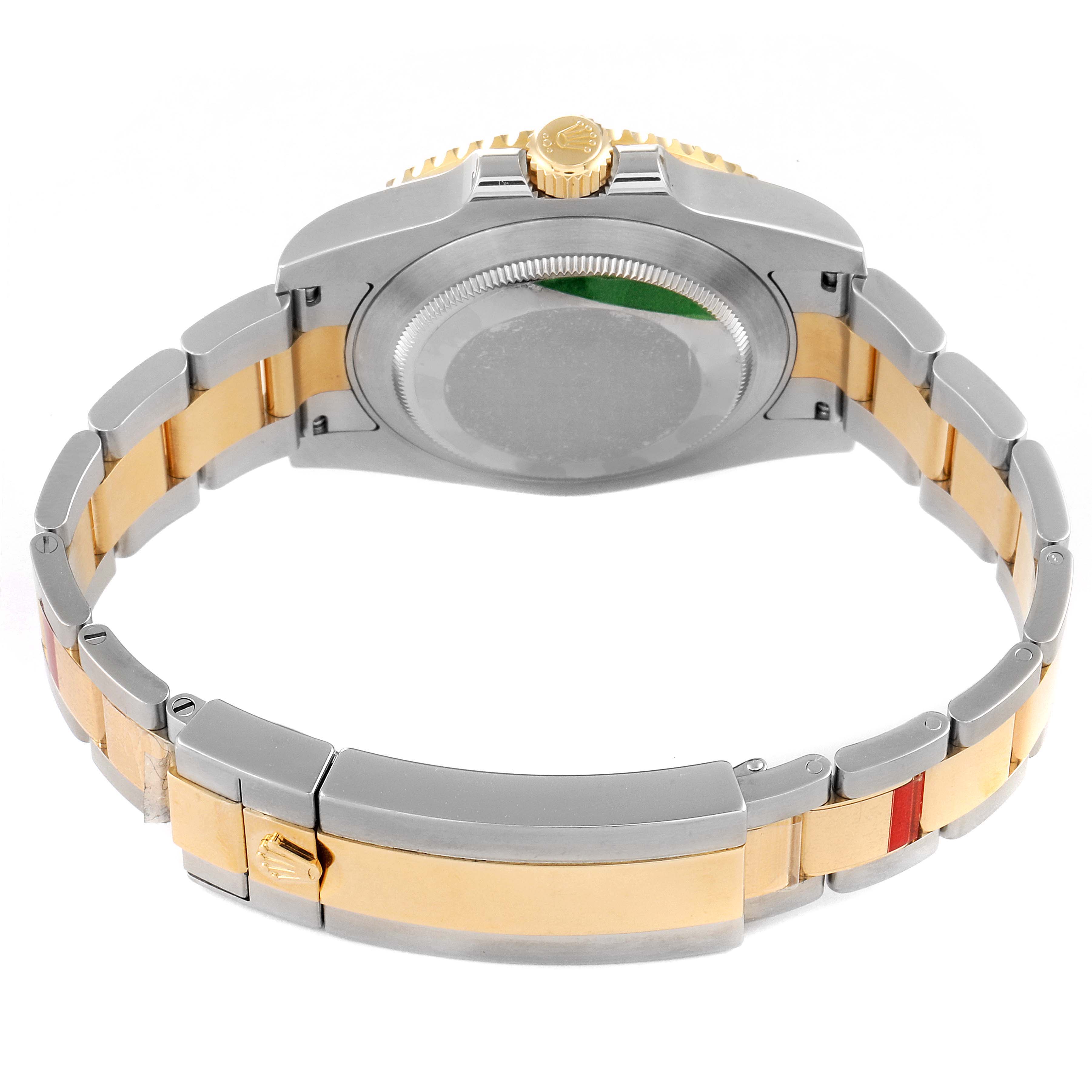 The image shows the back case and bracelet of a Rolex Submariner 116613 Men's Steel and Gold (two tone) Blue Dial 116613 Men's Steel and Gold (two tone) Blue Dial watch from a rear angle.