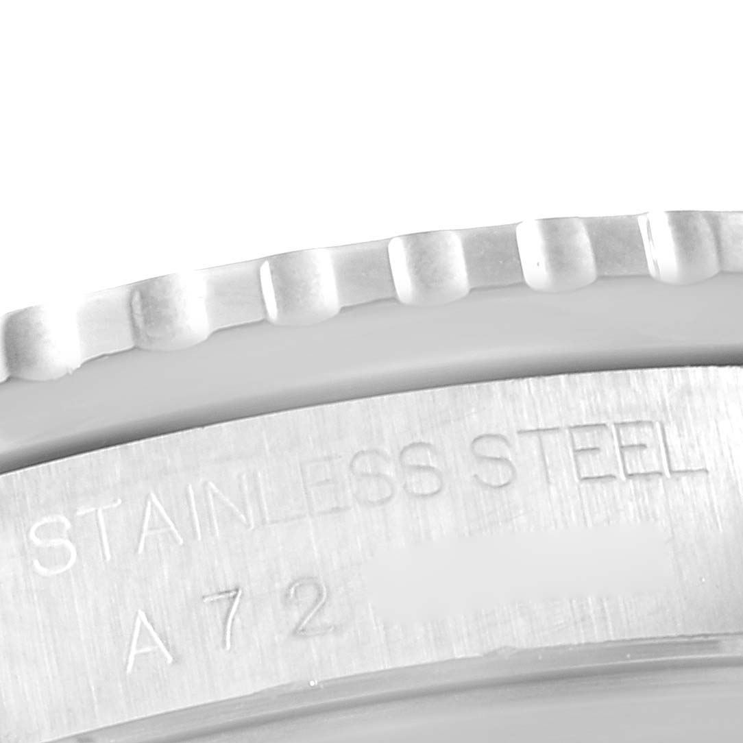 This close-up image of the Rolex Turn-o-Graph 16264 Men
s Stainless Steel White Dial 16264 Men
s Stainless Steel White Dial shows the stainless steel bezel and part of the engraved text.
