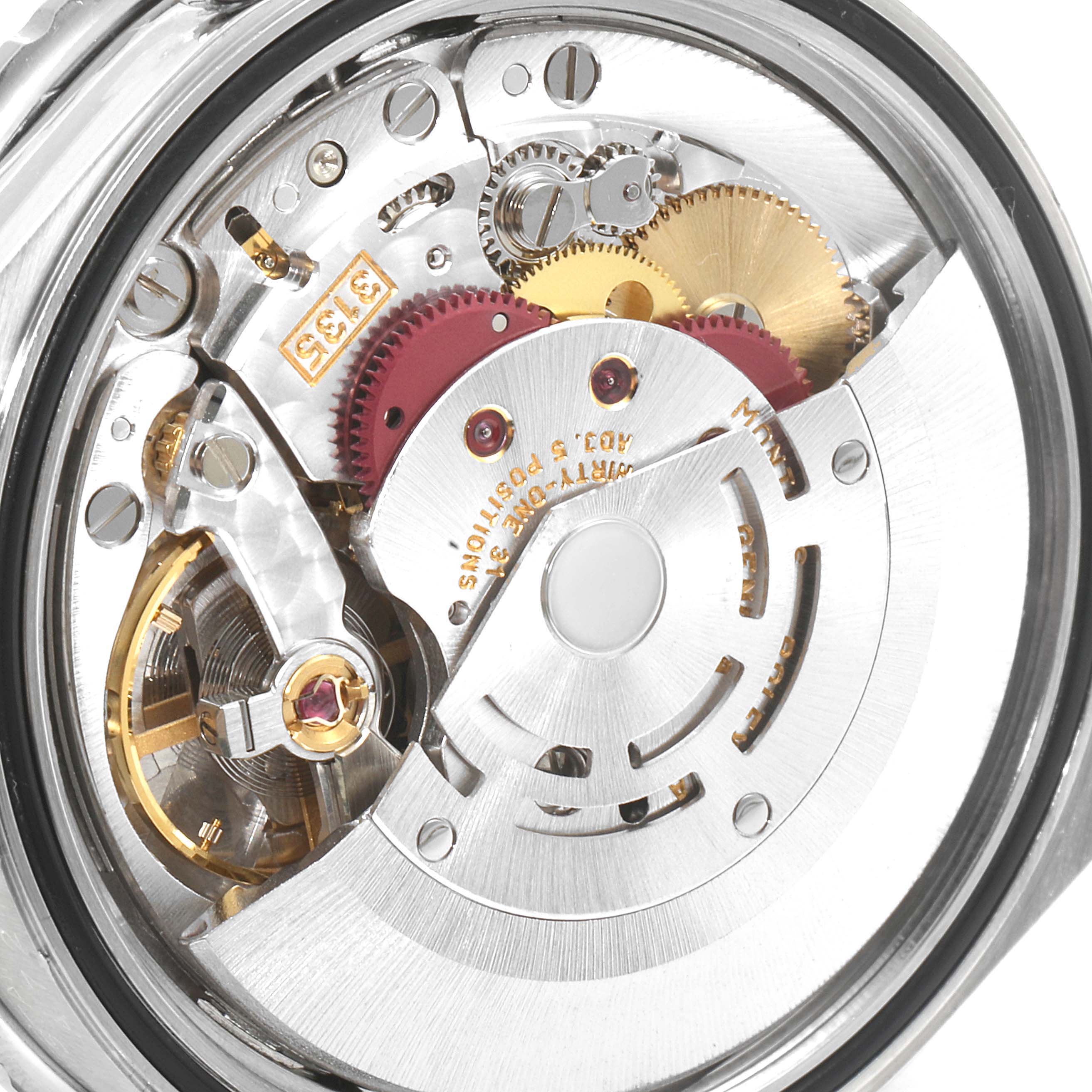 The image shows a close-up of the internal mechanism of a Rolex Turn-o-Graph 16264 Men
s Stainless Steel White Dial 16264 Men
s Stainless Steel White Dial watch, highlighting gears and intricate components.