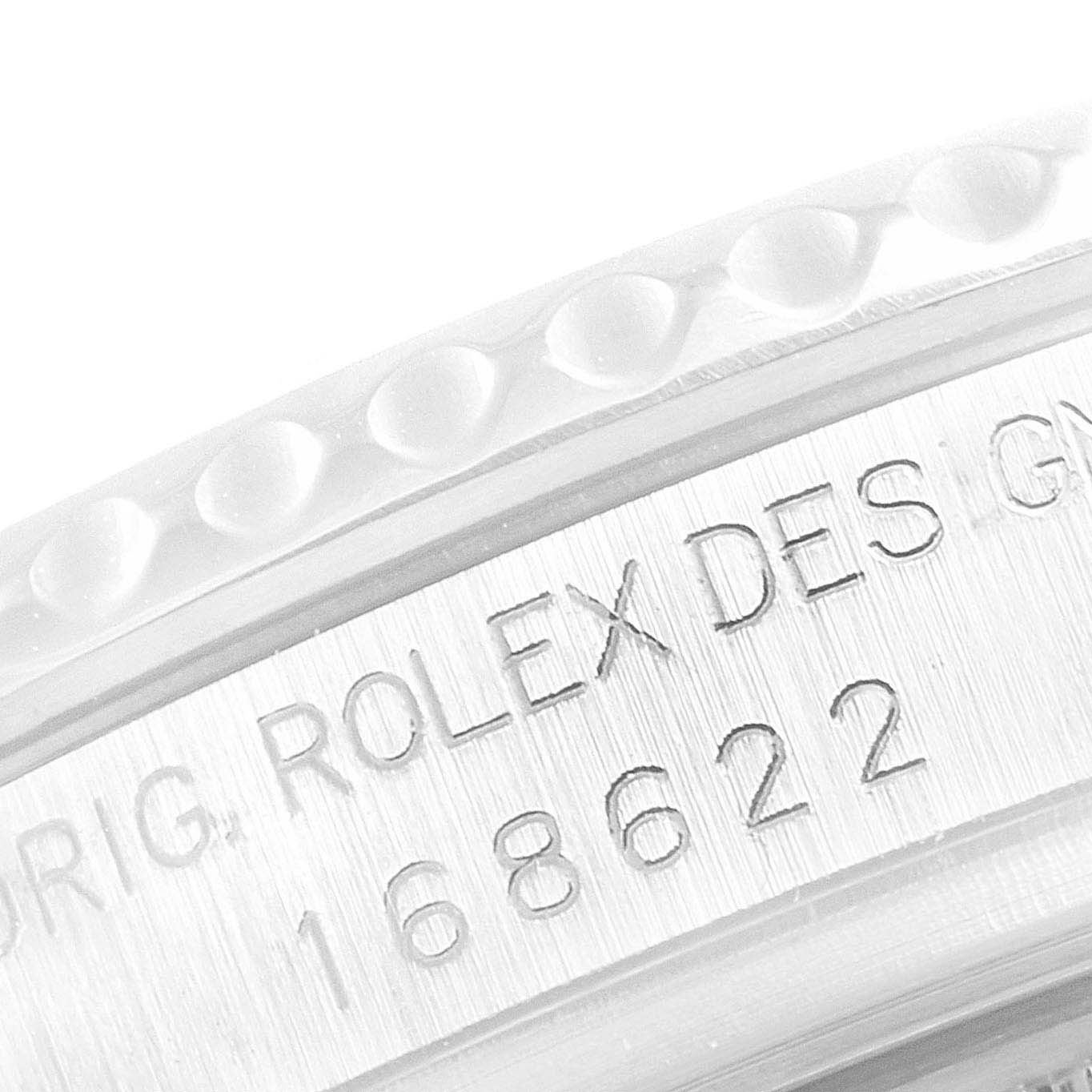 This is a close-up of the engraved side of the bezel and case of the Rolex Yacht-Master 168622 Men
s Stainless Steel Silver Dial 168622 Men
s Stainless Steel Silver Dial watch, showing its model number and "Rolex Design."