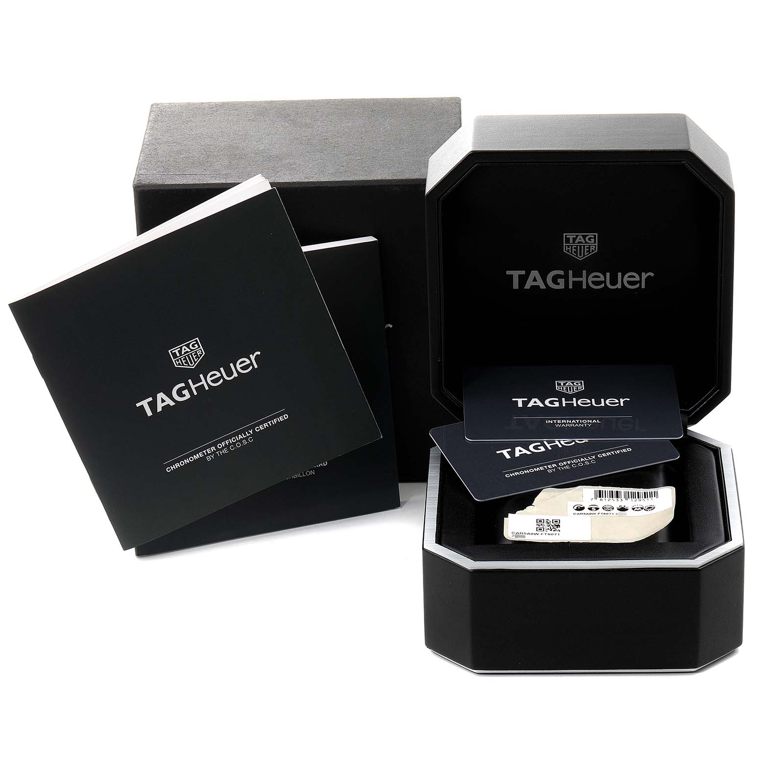The image shows the packaging and accessories of a Tag Heuer Carrera CAR5A8Y.FC6377 Men's Titanium Black Dial CAR5A8Y.FC6377 Men's Titanium Black Dial model watch, including a box, manuals, and warranty cards.