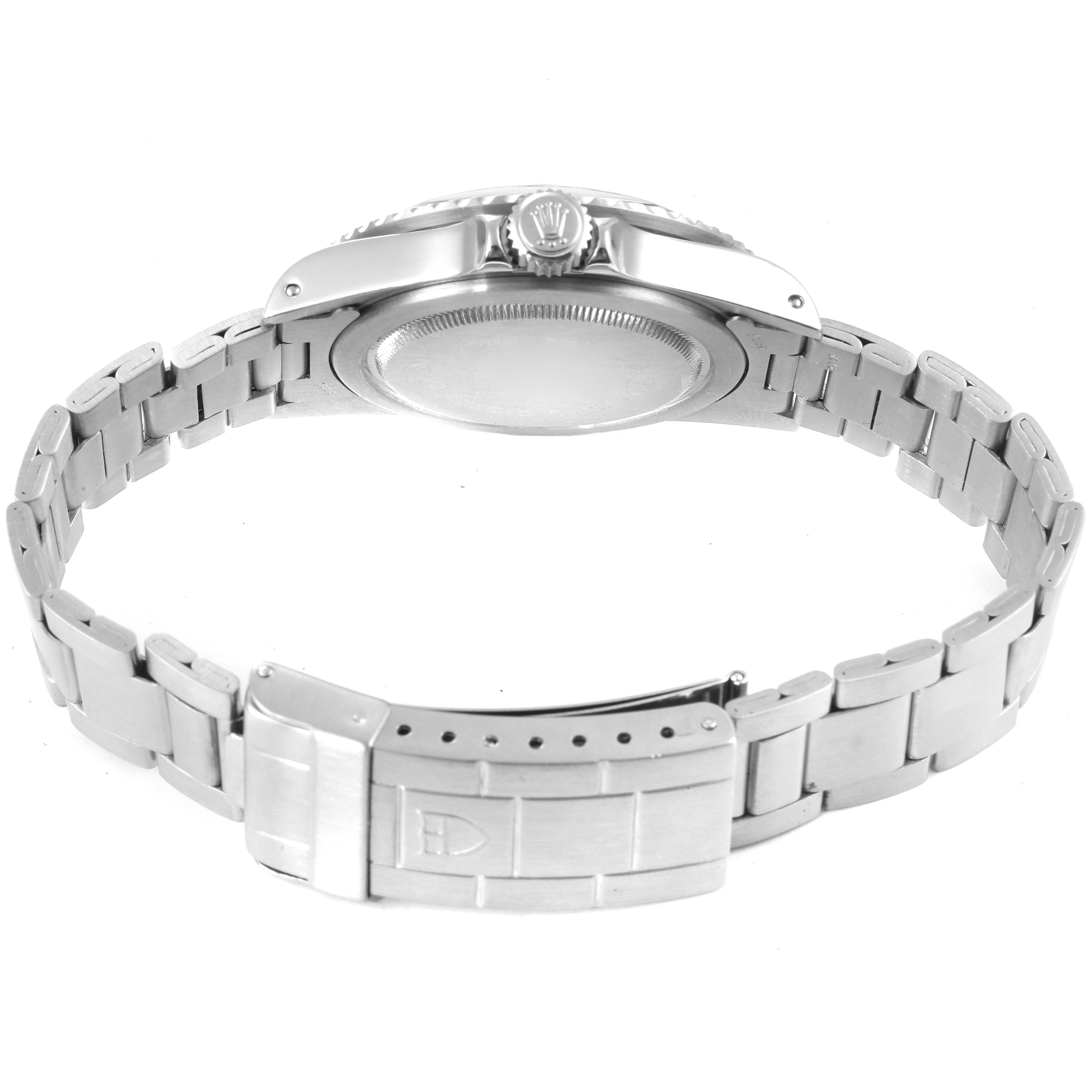 The image shows the back and side angles of a Tudor Submariner 79090 Men
s Stainless Steel Black Dial 79090 Men
s Stainless Steel Black Dial watch, highlighting the case back and bracelet with the clasp open.