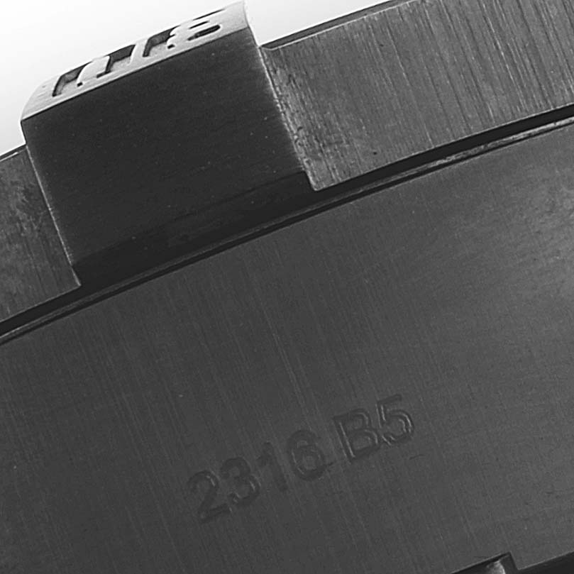 This image shows the close-up of the bezel and part of the casing for a Breitling Avenger M17331 Men's Stainless Steel Yellow Dial M17331 Men's Stainless Steel Yellow Dial watch.