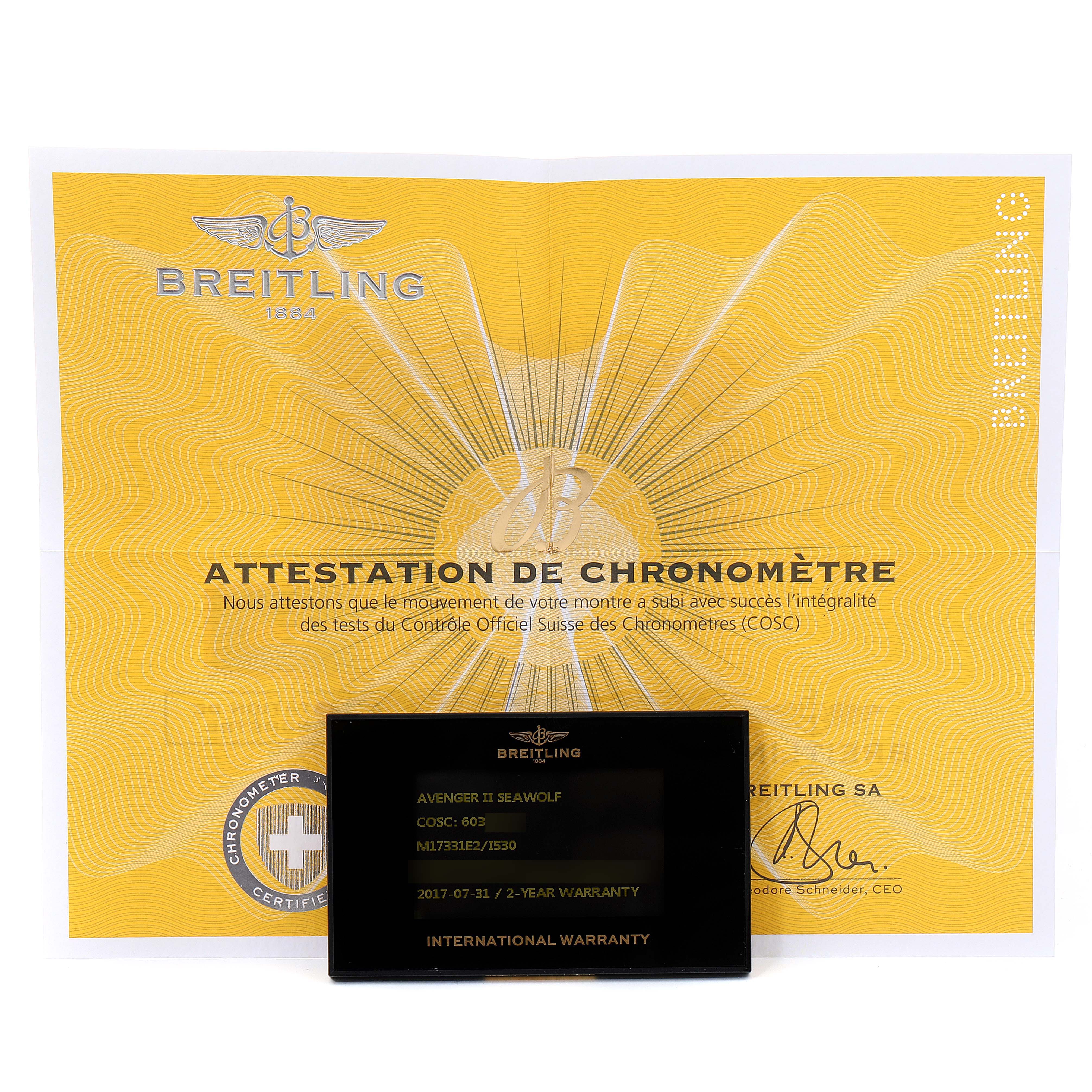 The image shows the international warranty card and chronometer certificate for the Avenger II Seawolf model by Breitling.