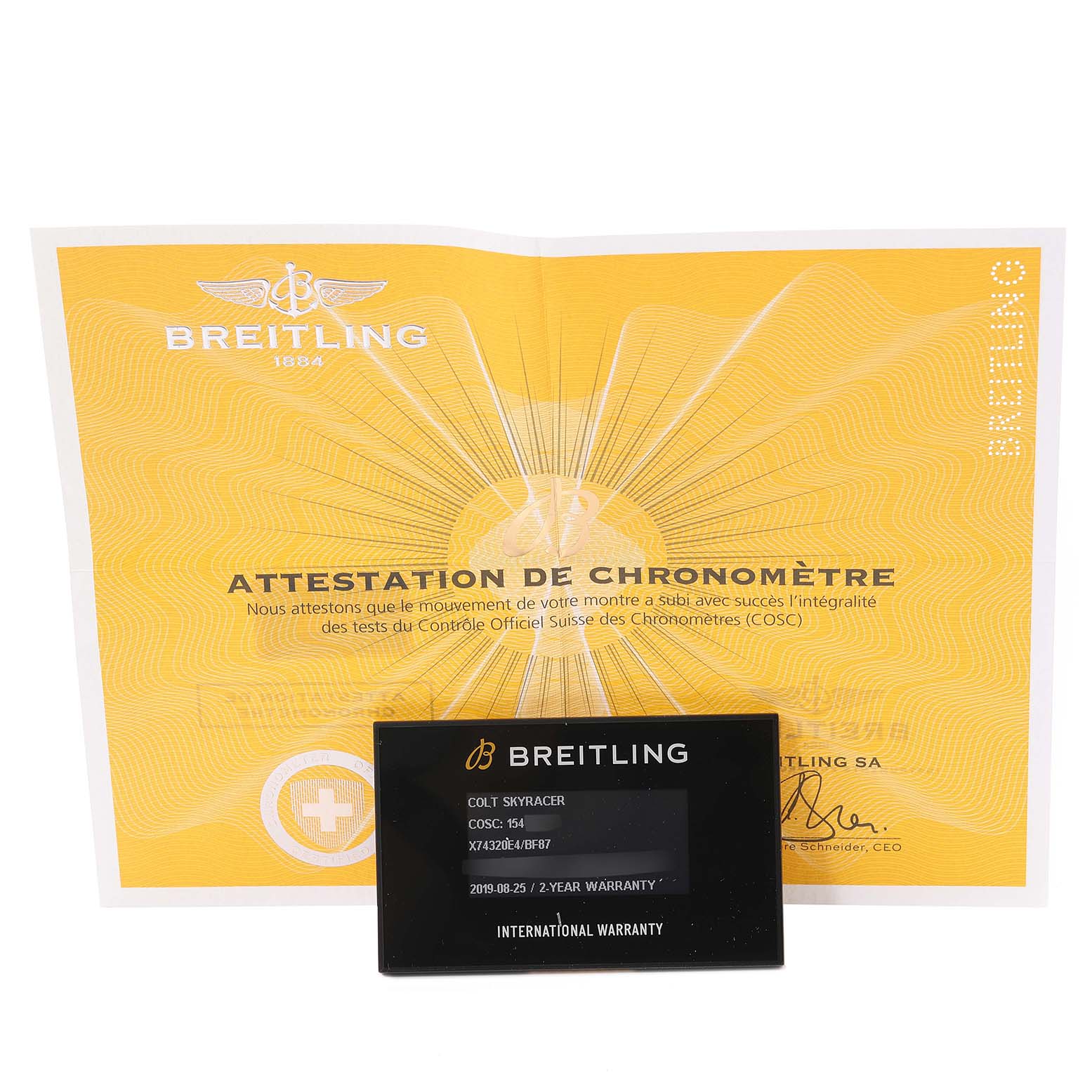 The image shows the Breitling Colt X74320E4/BF87 Men's Ceramic Black Dial X74320E4/BF87 Men's Ceramic Black Dial model's chronometer certificate and an international warranty card.