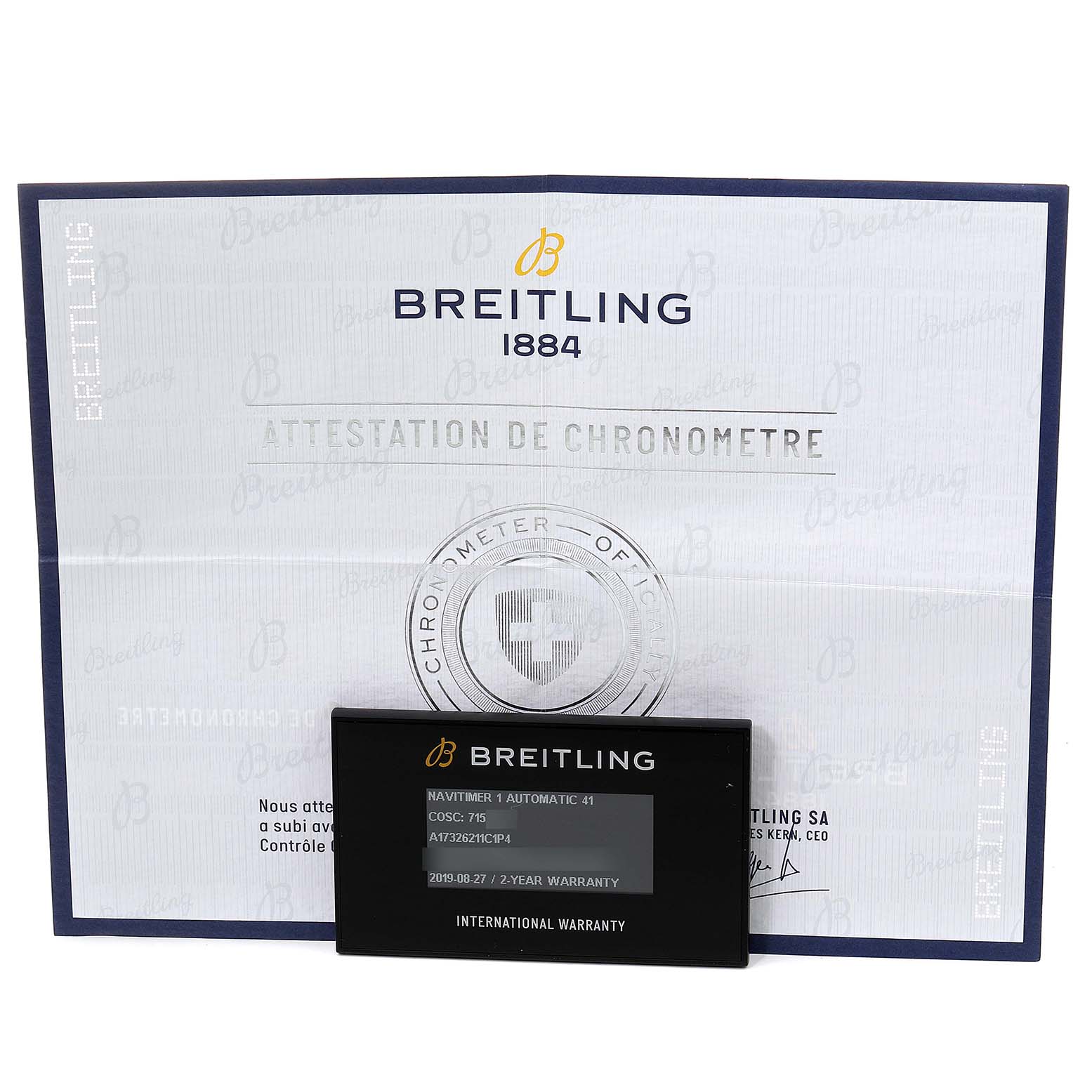 The image shows the Breitling Navitimer A17326 Men's Stainless Steel Blue Dial A17326 Men's Stainless Steel Blue Dial model's chronometer certification and international warranty card, presented frontally.