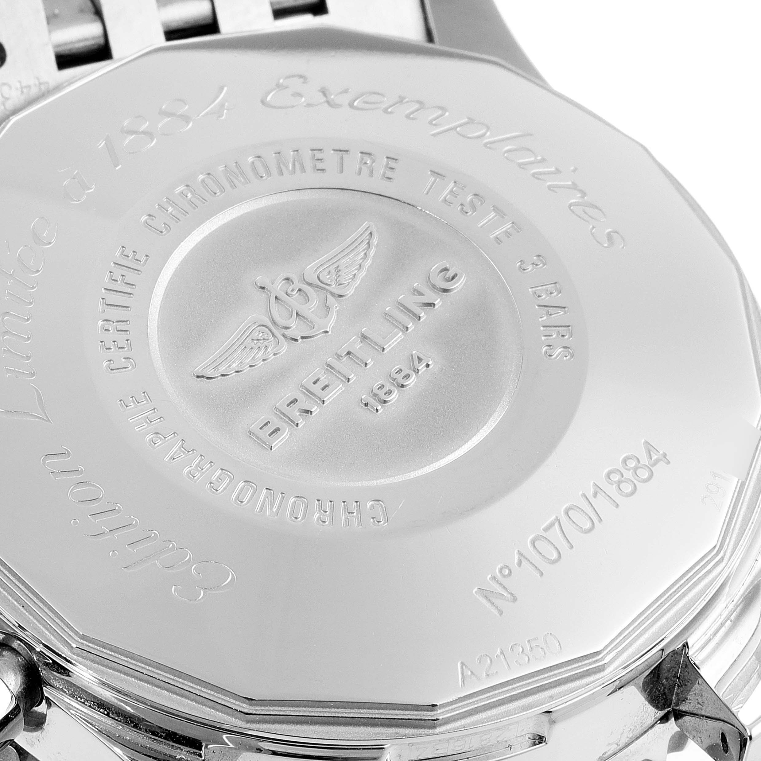 This image shows the back case of a Breitling Navitimer A2135024/BE62-453A Men's Stainless Steel Black Dial A2135024/BE62-453A Men's Stainless Steel Black Dial watch, highlighting its engraved details and bracelet attachment.