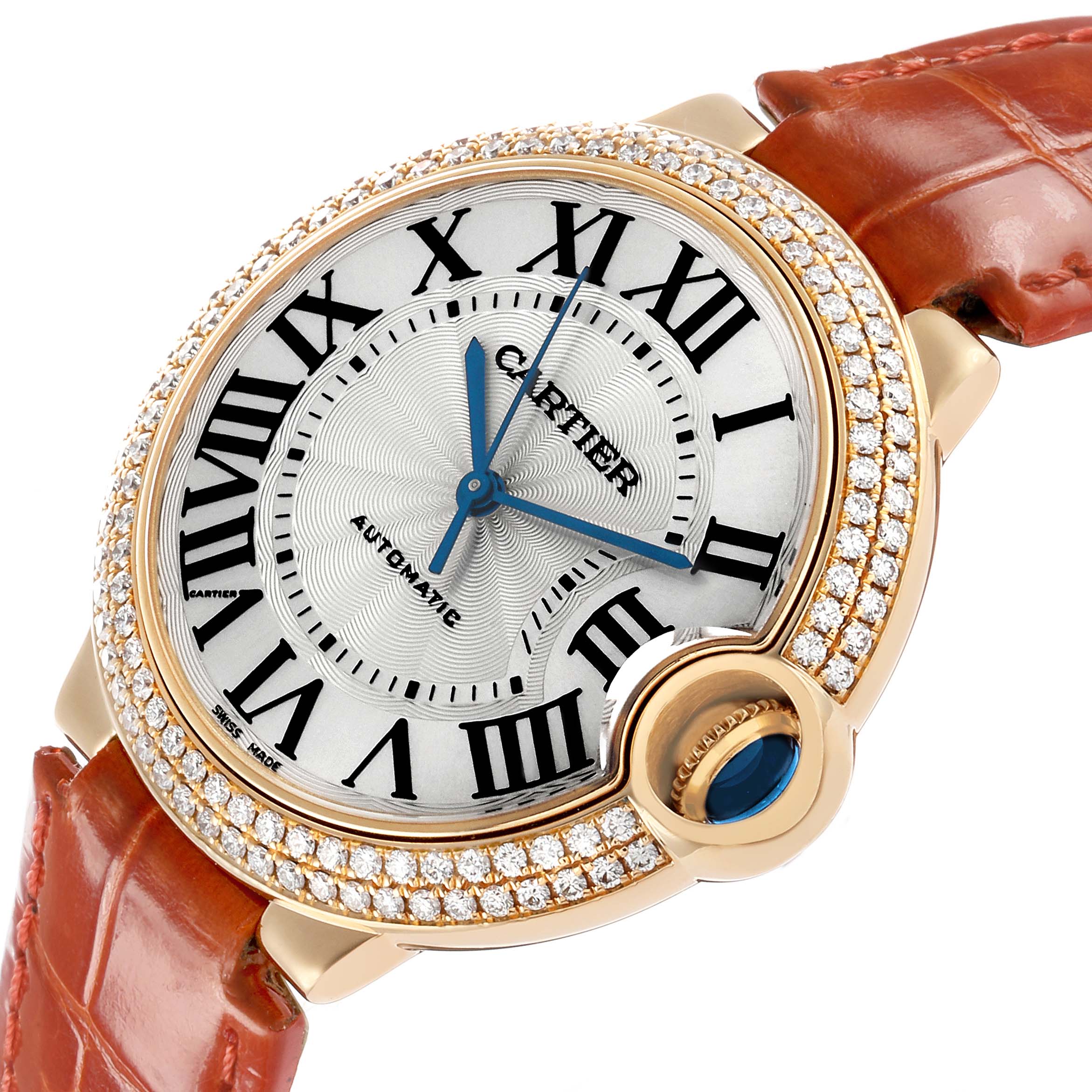 The Cartier Ballon Bleu WE900451 Men's Yellow Gold Silver Dial watch is shown at an angled view, highlighting its round face, Roman numerals, and diamond-studded bezel.