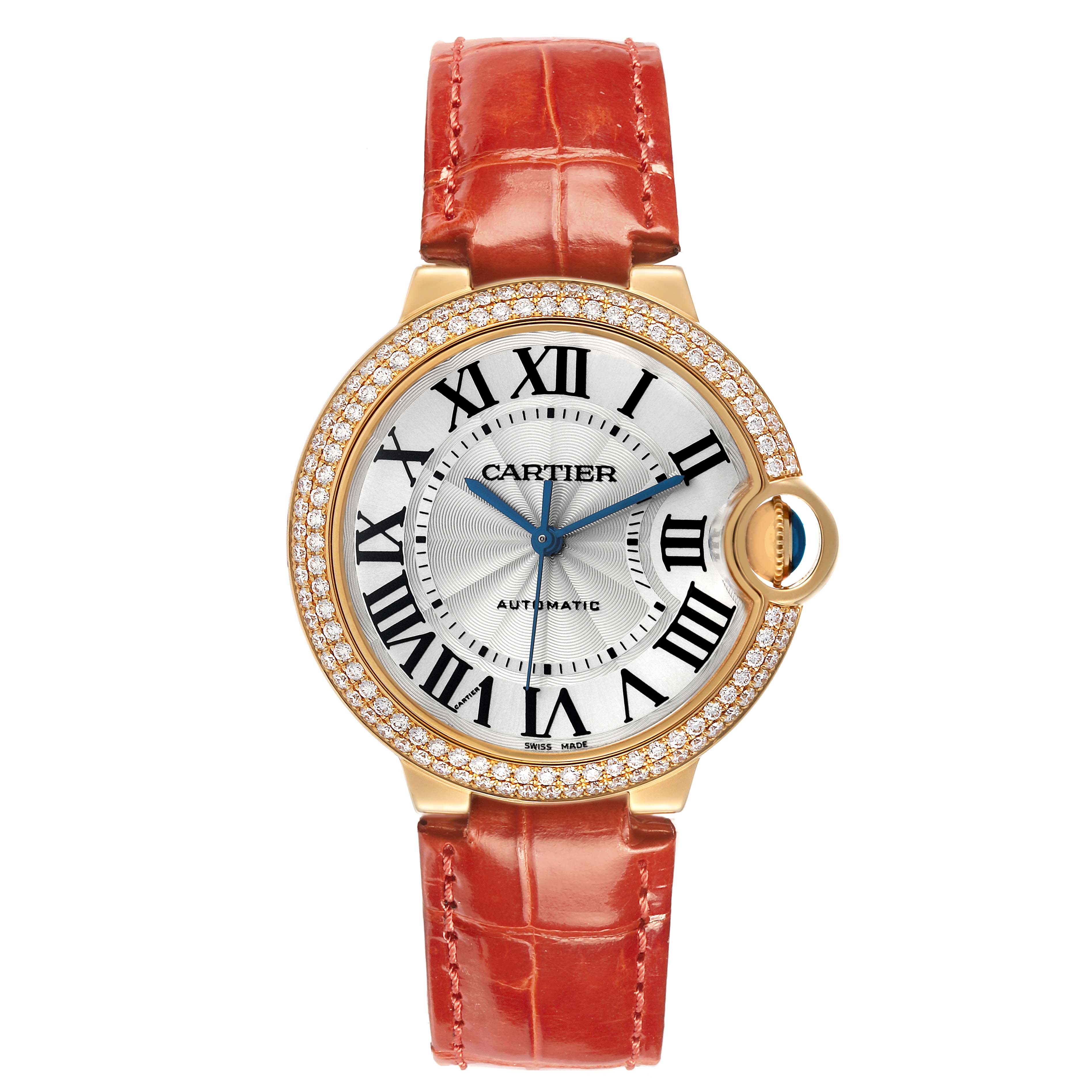 The Cartier Ballon Bleu WE900451 Men's Yellow Gold Silver Dial watch is shown from the front, highlighting its face, strap, and diamond-encrusted bezel.