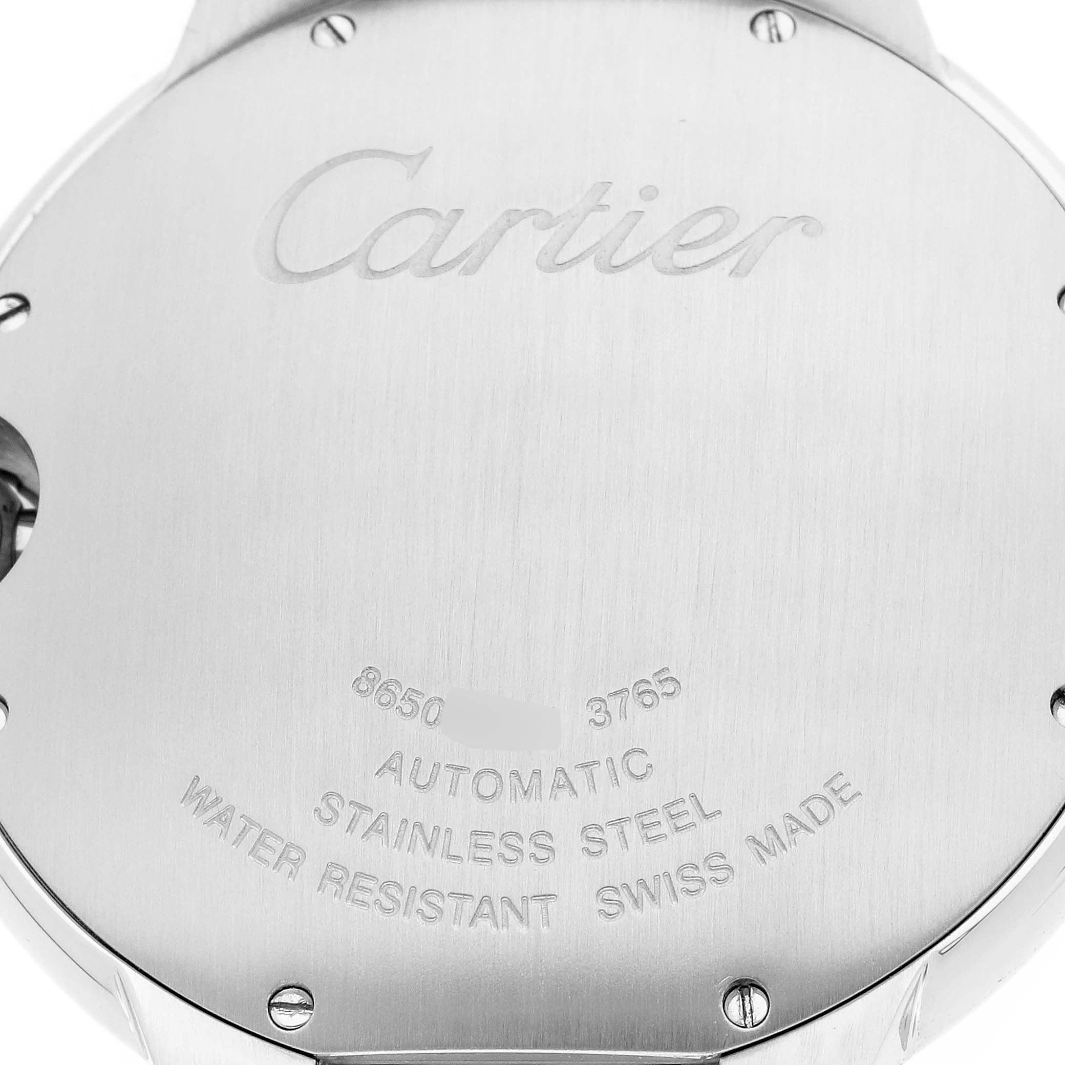 The image shows the back of a Cartier Ballon Bleu W6920042 Men's Stainless Steel Black Dial watch highlighting the engraved details and screws.