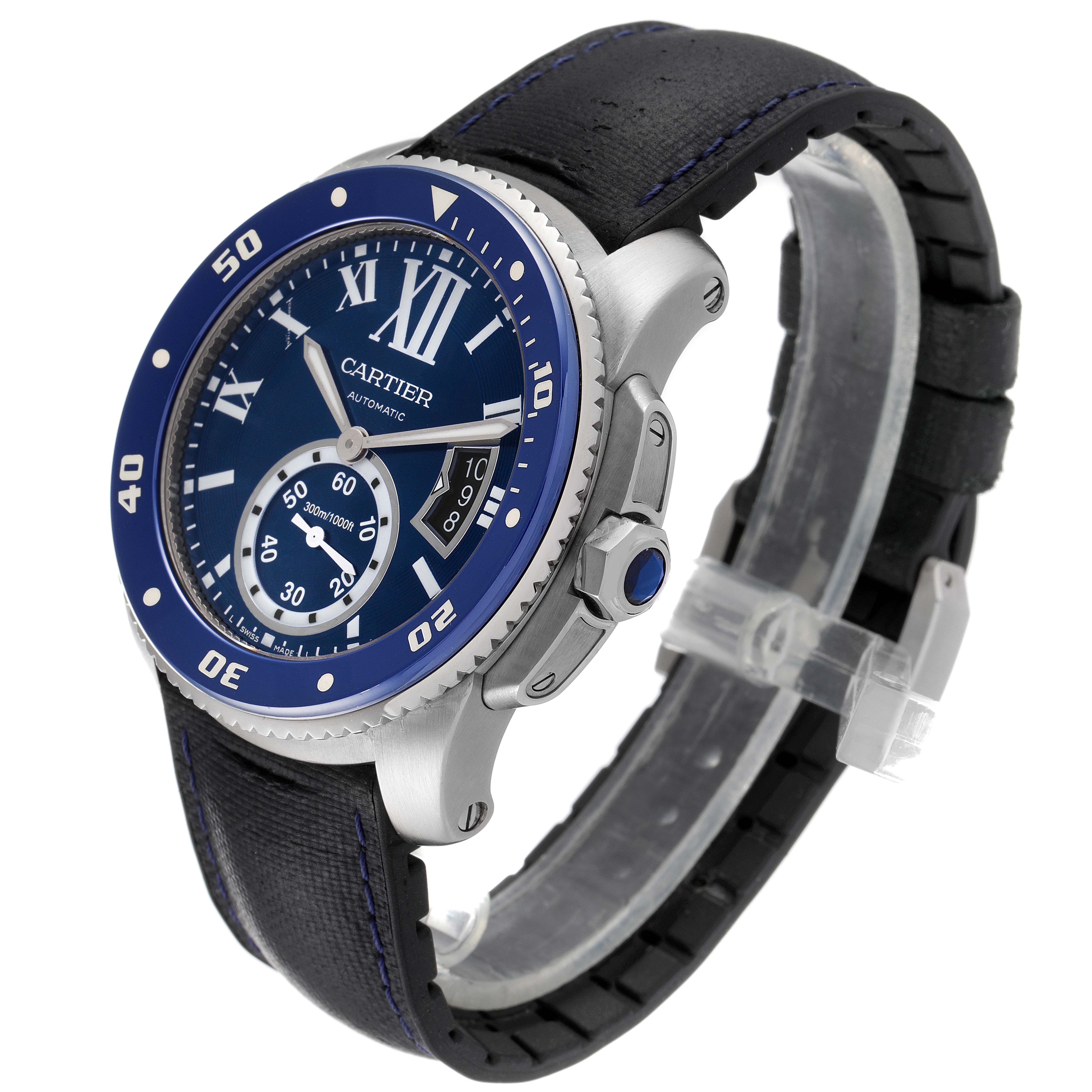 This image shows a Calibre de Cartier watch by Cartier at a three-quarter angle, highlighting the bezel, dial, crown, and strap.