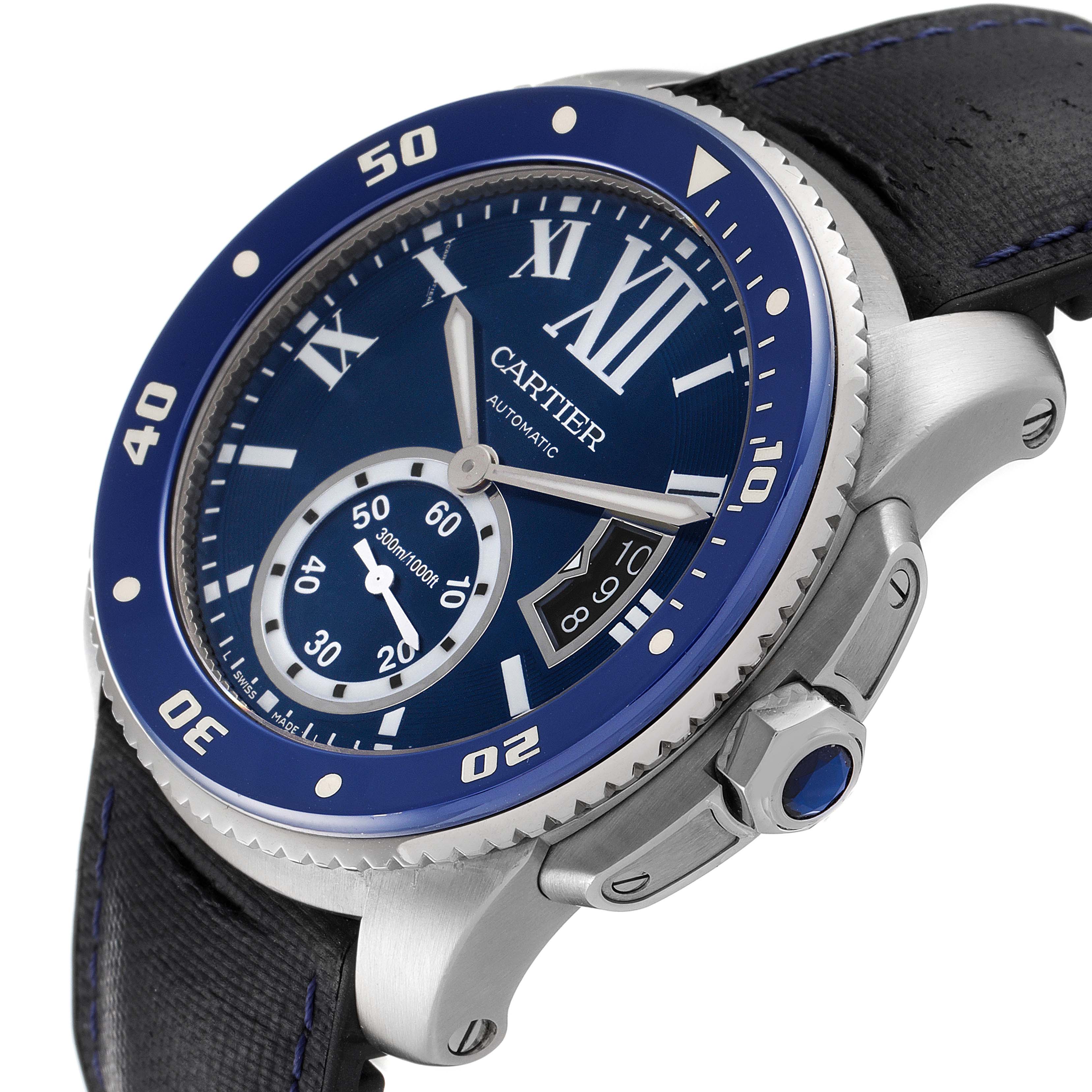 This image shows a close-up angled view of the Calibre de Cartier watch, highlighting its blue dial and bezel, crown, and strap.