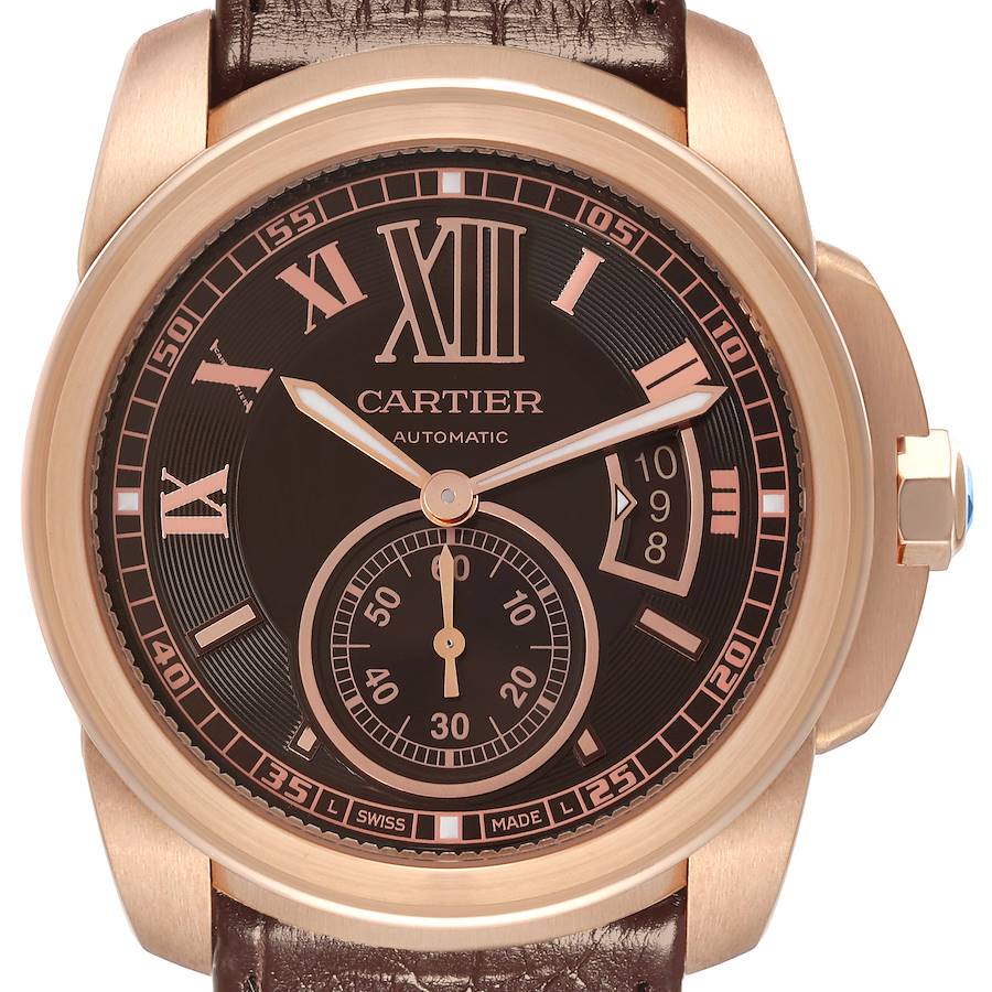 The image shows a front view of the Calibre de Cartier watch face, bezel, crown, and leather strap.