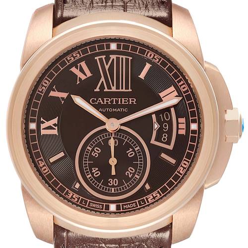 The image shows a front view of the Calibre de Cartier watch, highlighting the dial, hands, and leather strap.