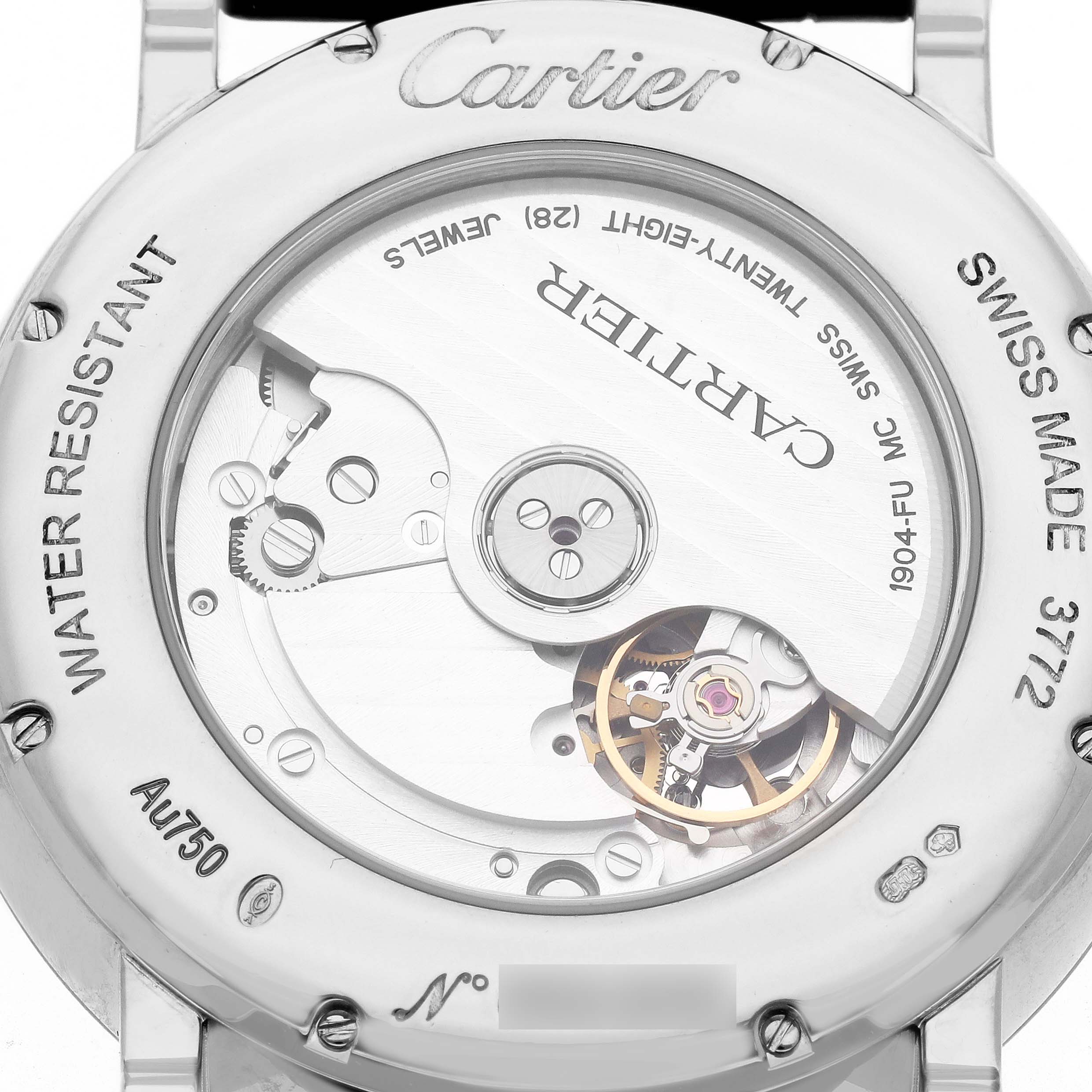 The Rotonde model by Cartier is shown from the back, displaying the movement mechanism and inscriptions.