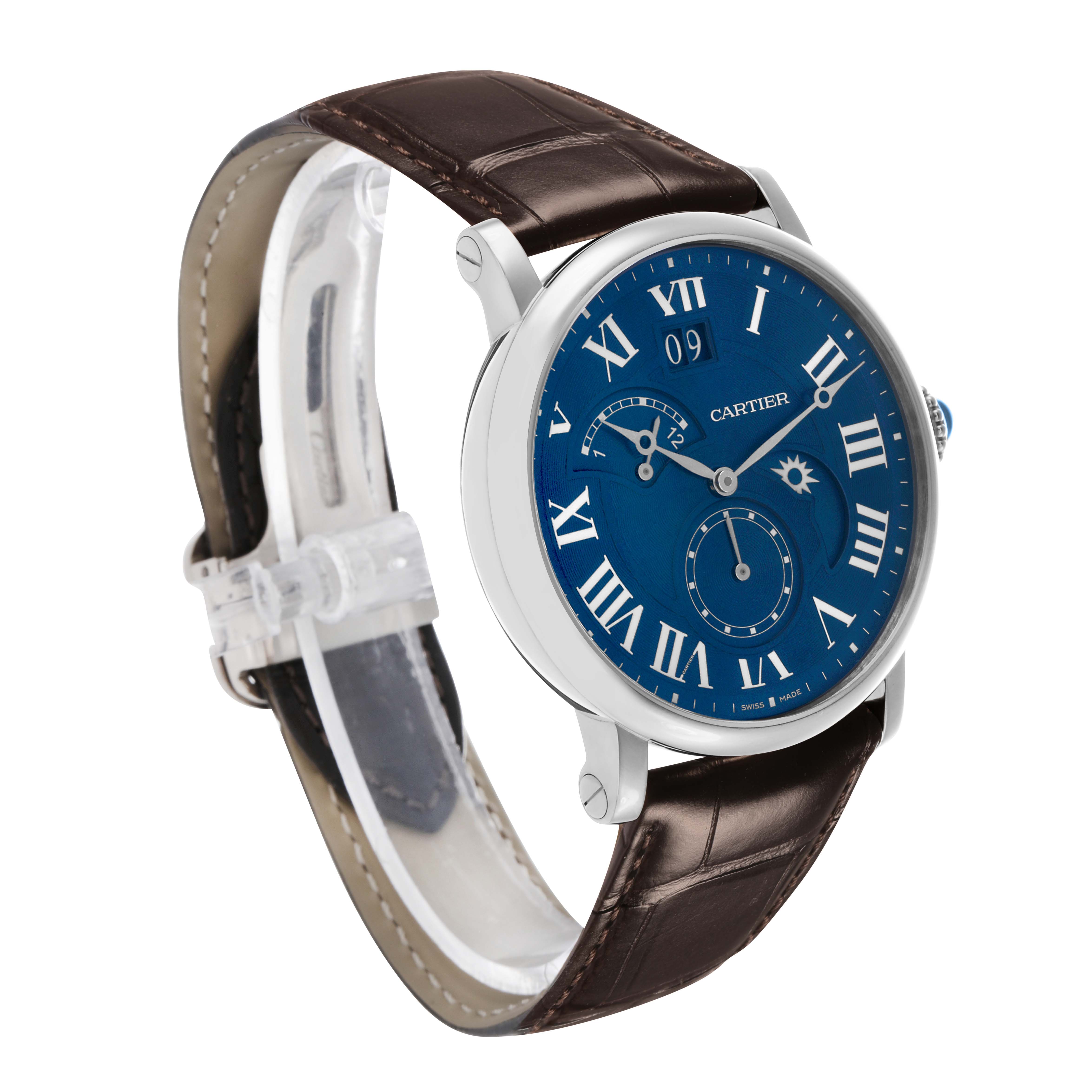 The Rotonde de Cartier watch is shown at an angle highlighting its blue dial, Roman numerals, and brown leather strap.
