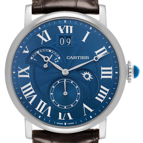 The Rotonde de Cartier watch is shown from the front, displaying its blue dial, Roman numeral hour markers, and subdials.