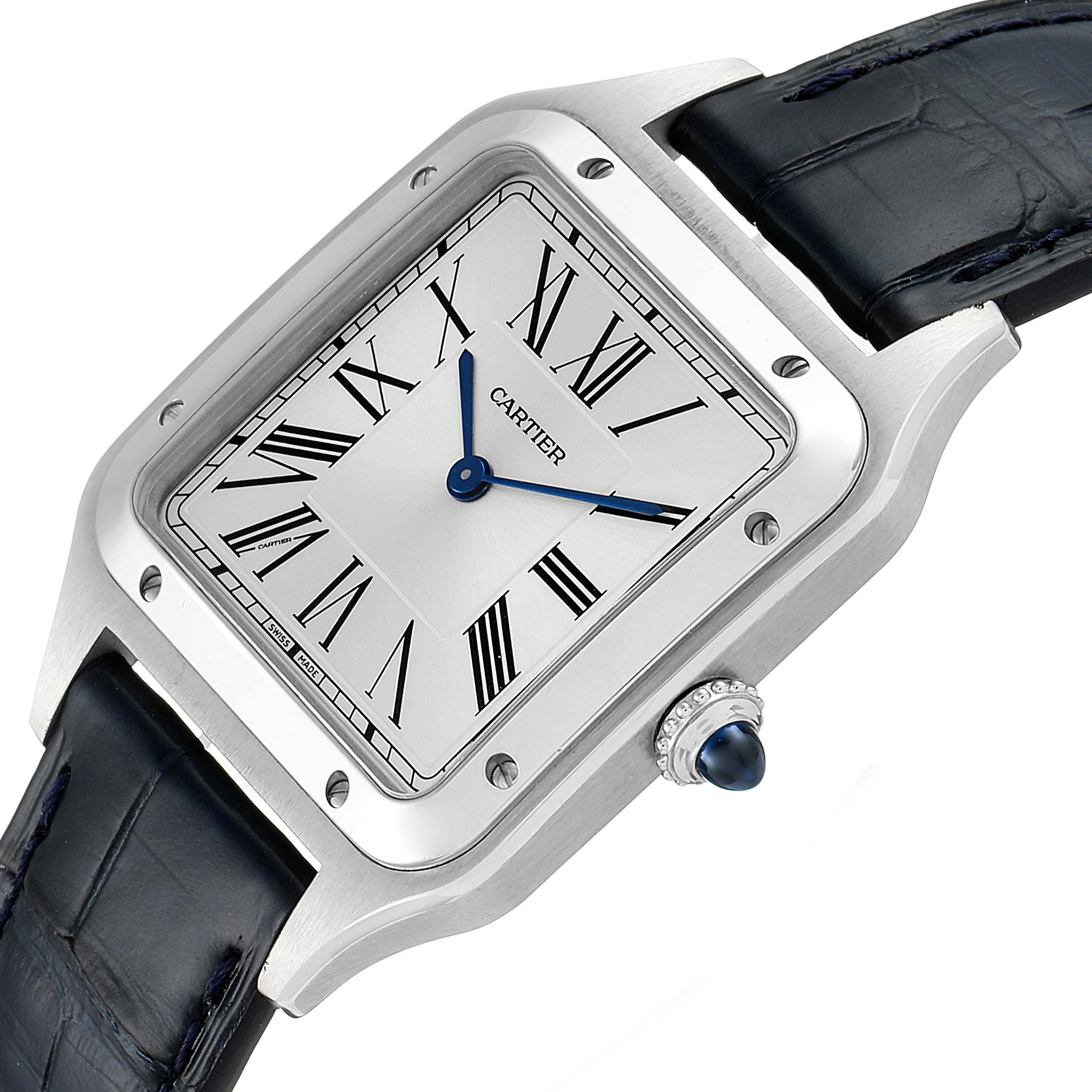 The image shows a close-up of the Cartier Santos Dumont WSSA0022 Men's Stainless Steel Silver Dial WSSA0022 Men's Stainless Steel Silver Dial watch, highlighting its face, crown with a sapphire cabochon, and leather strap.