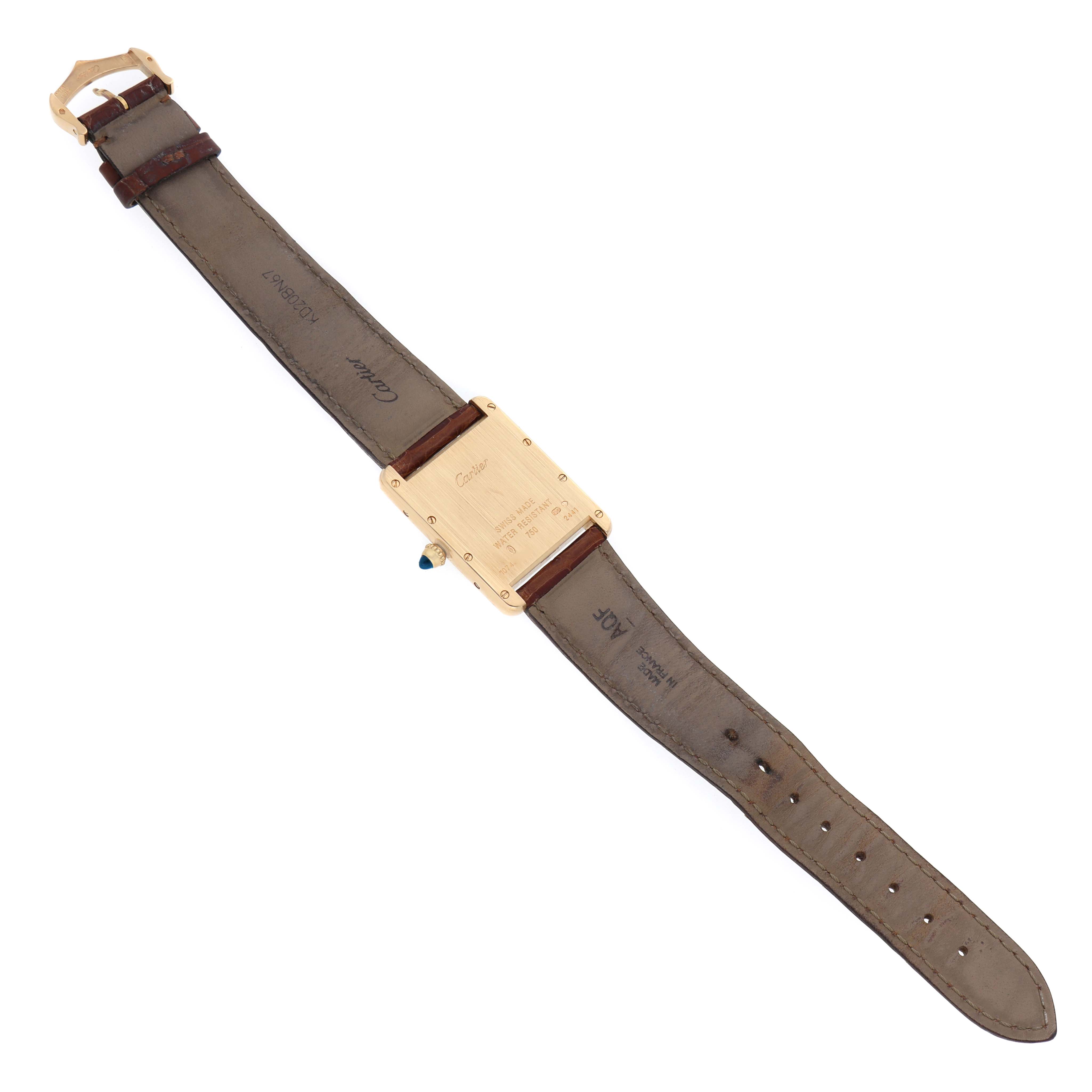 The Cartier Tank Louis W1529756 Men's Yellow Gold Silver Dial watch is shown from the back, displaying the case back, strap, and buckle.