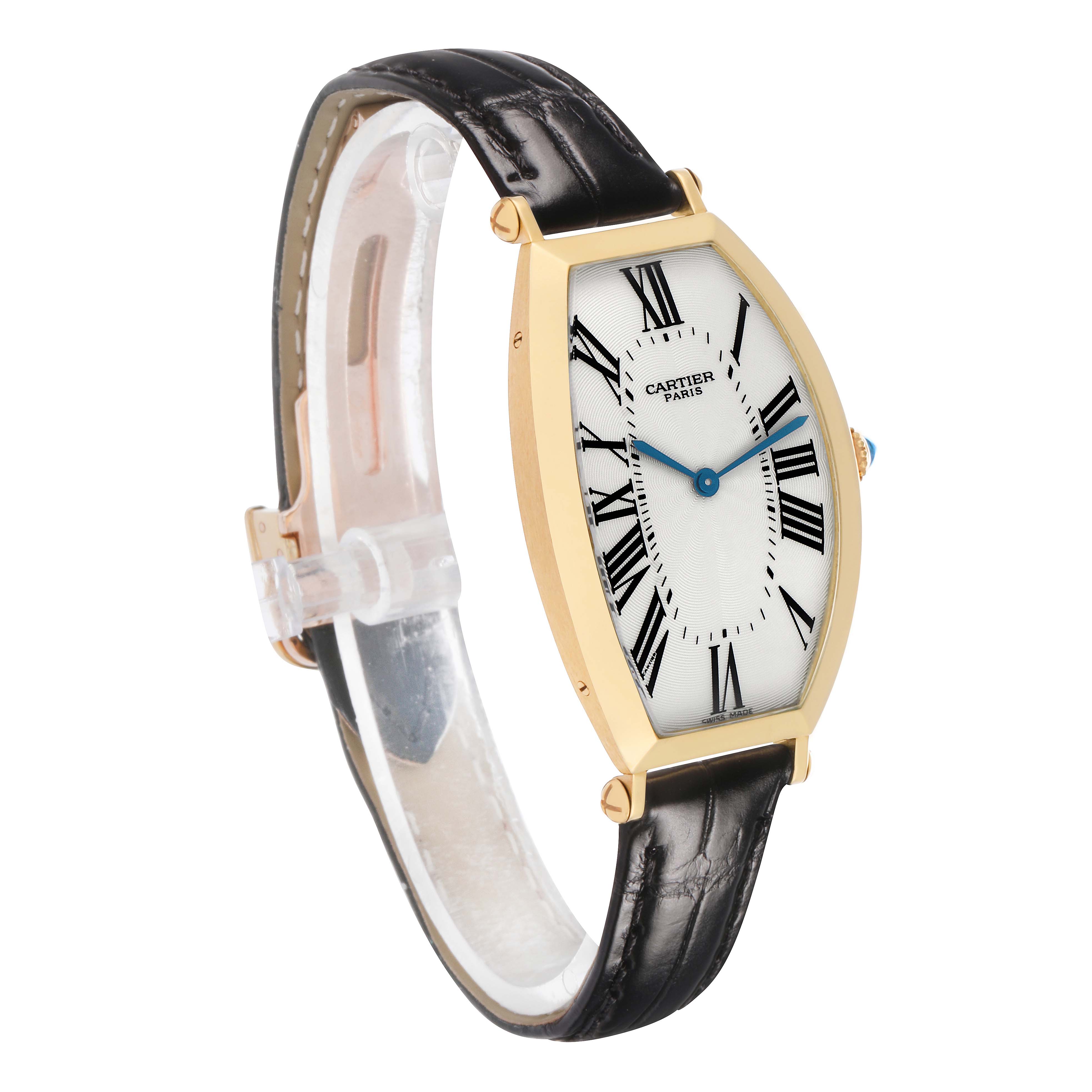 The Cartier Tonneau W1527651F Men's Yellow Gold Silver Dial watch is shown from a slightly tilted side angle, displaying the face, strap, and crown.