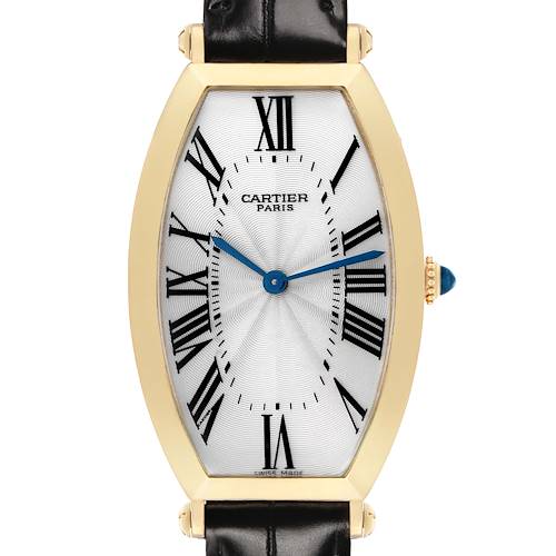 The Cartier Tonneau W1527651F Men's Yellow Gold Silver Dial watch is shown from the front, displaying its face, Roman numerals, and leather strap.