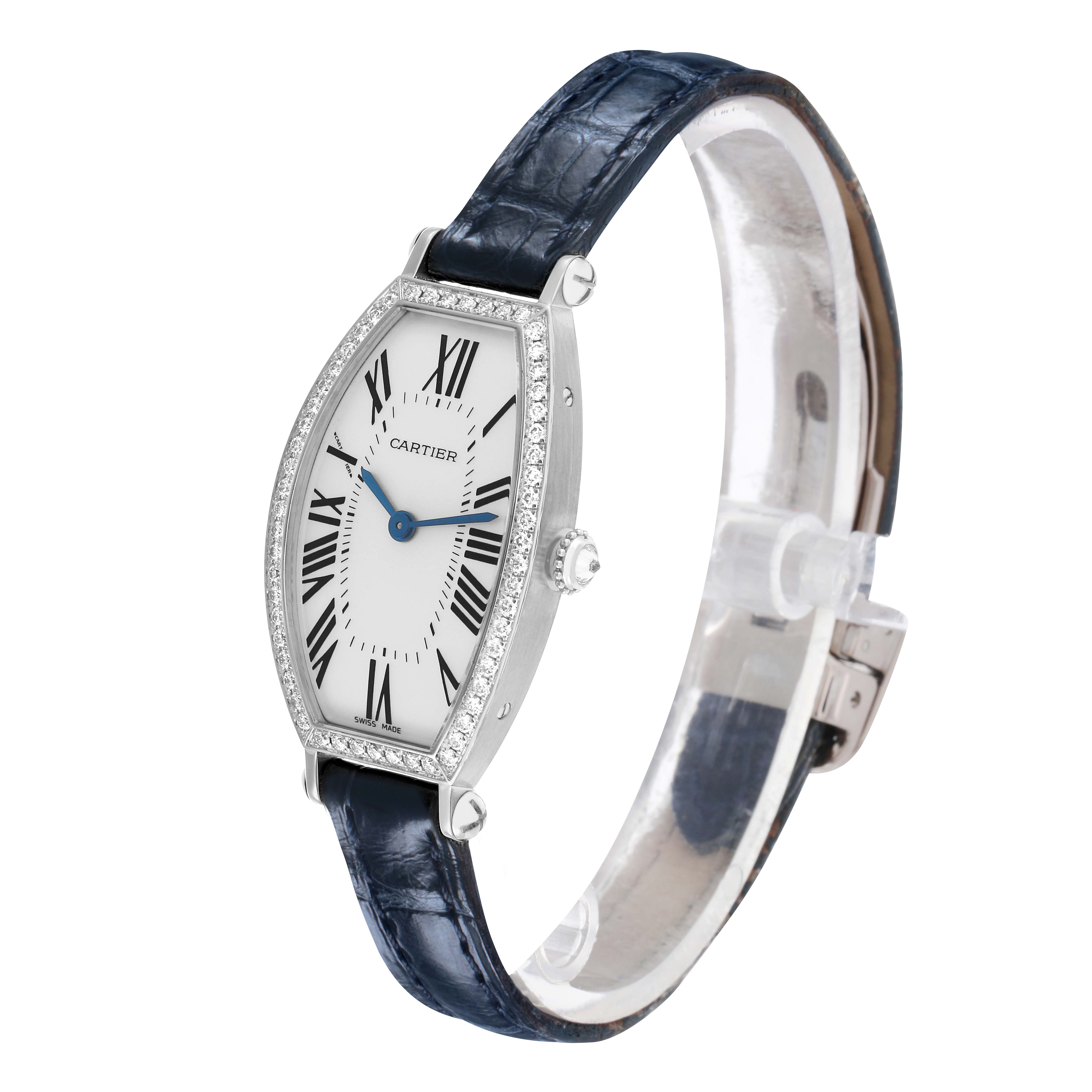 The Cartier Tonneau WE400131 Women's White Gold Silver Dial watch is shown at a side angle, displaying the face, bezel, crown, and strap.